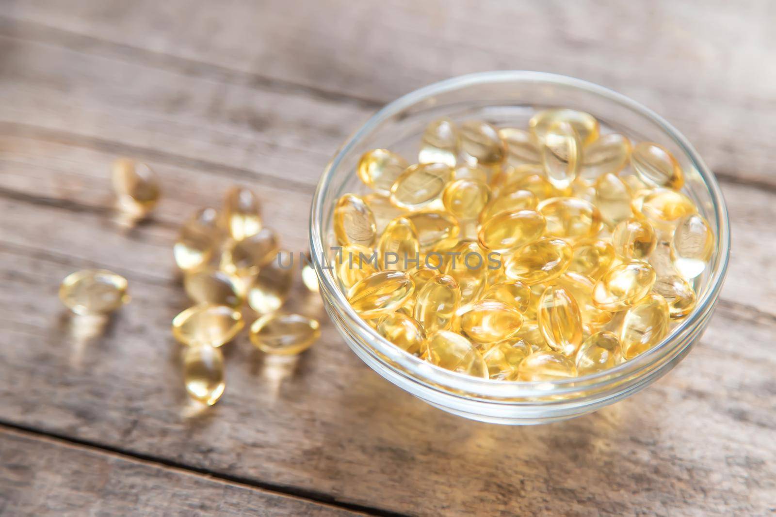 Vitamin E in fat-soluble capsules. Selective focus. food.
