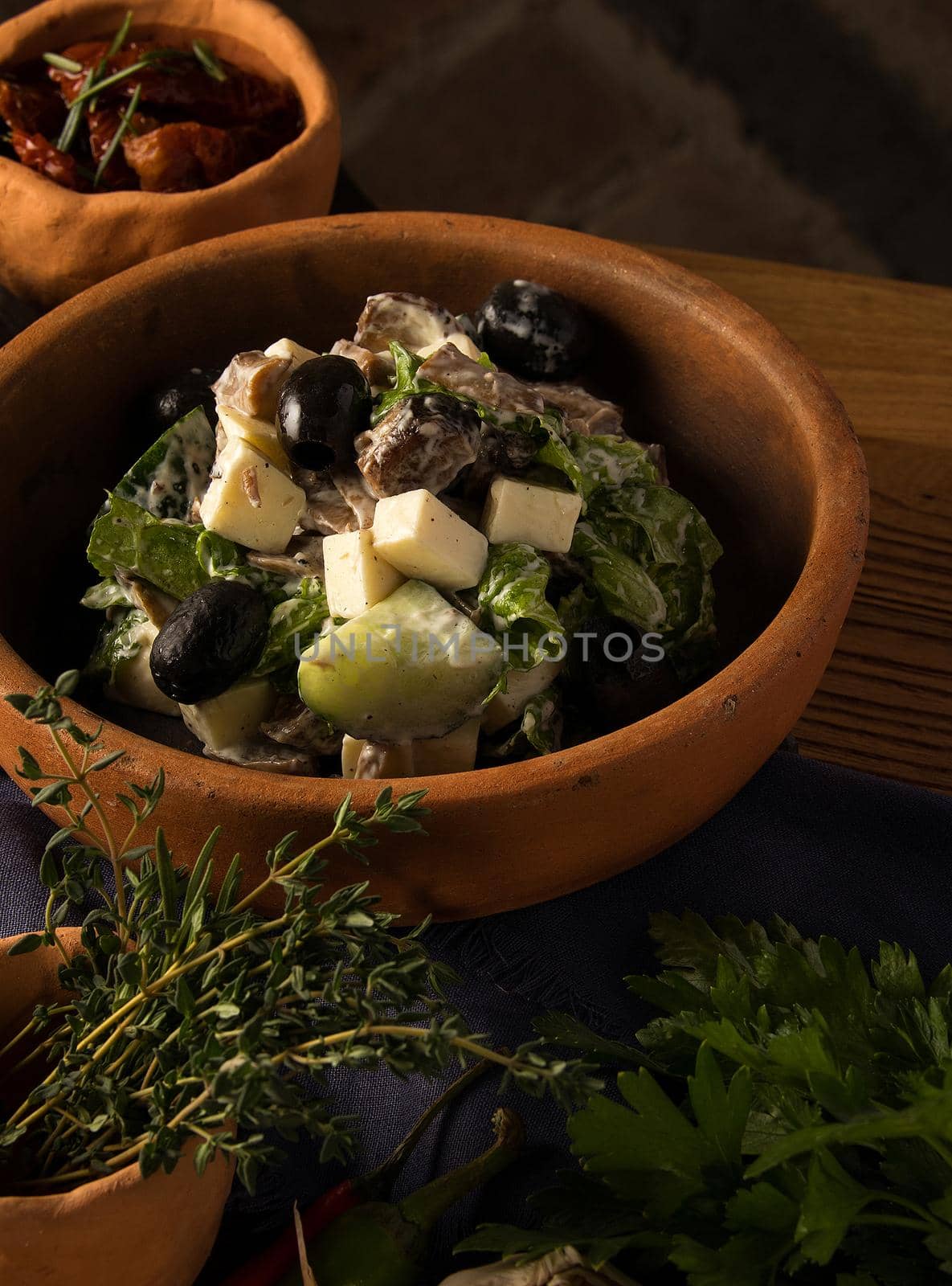 A closeup shot of a gourmet Georgian salad on a restaurant table