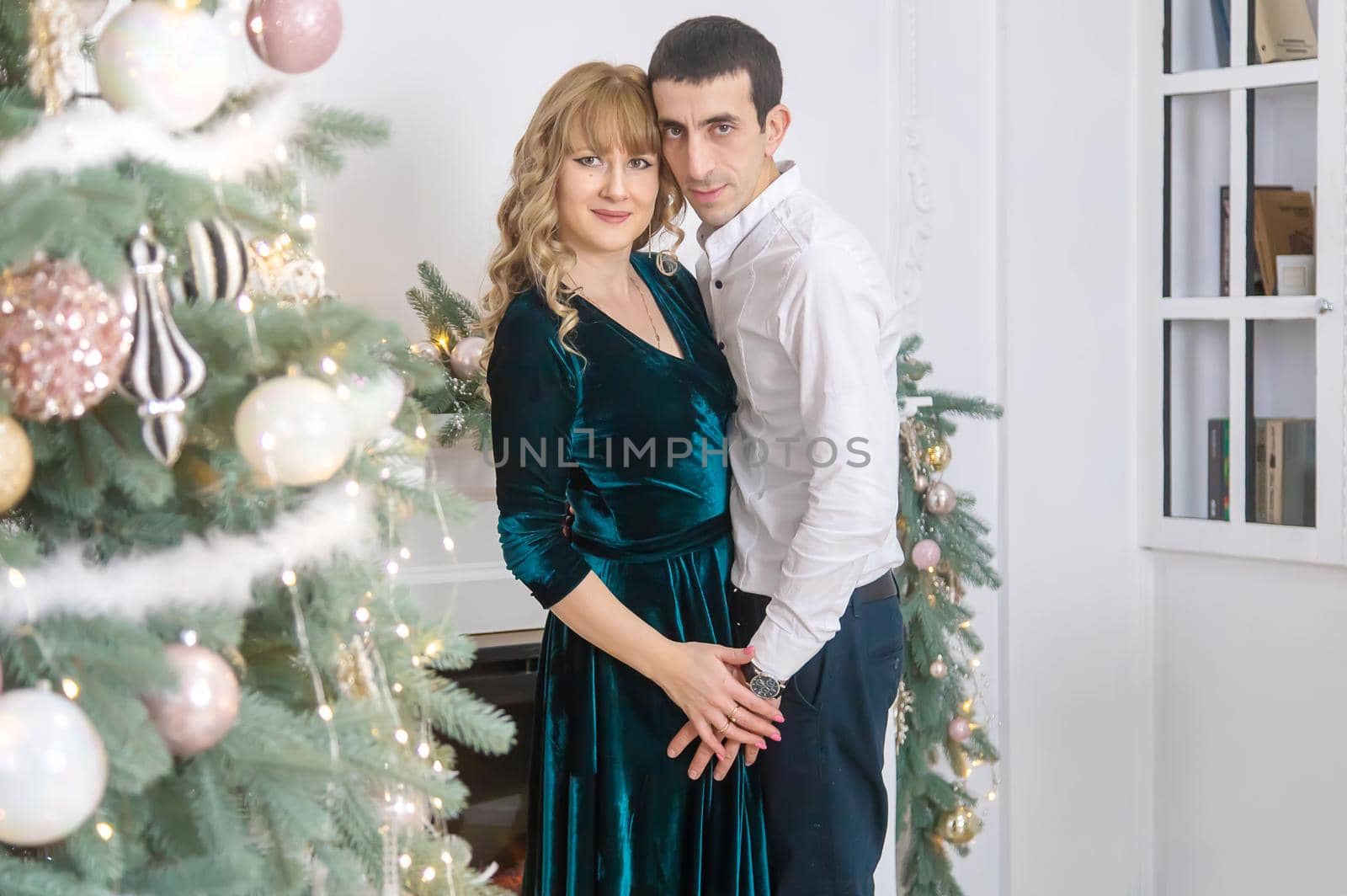 Man and woman on a Christmas background. Selective focus. Holiday.