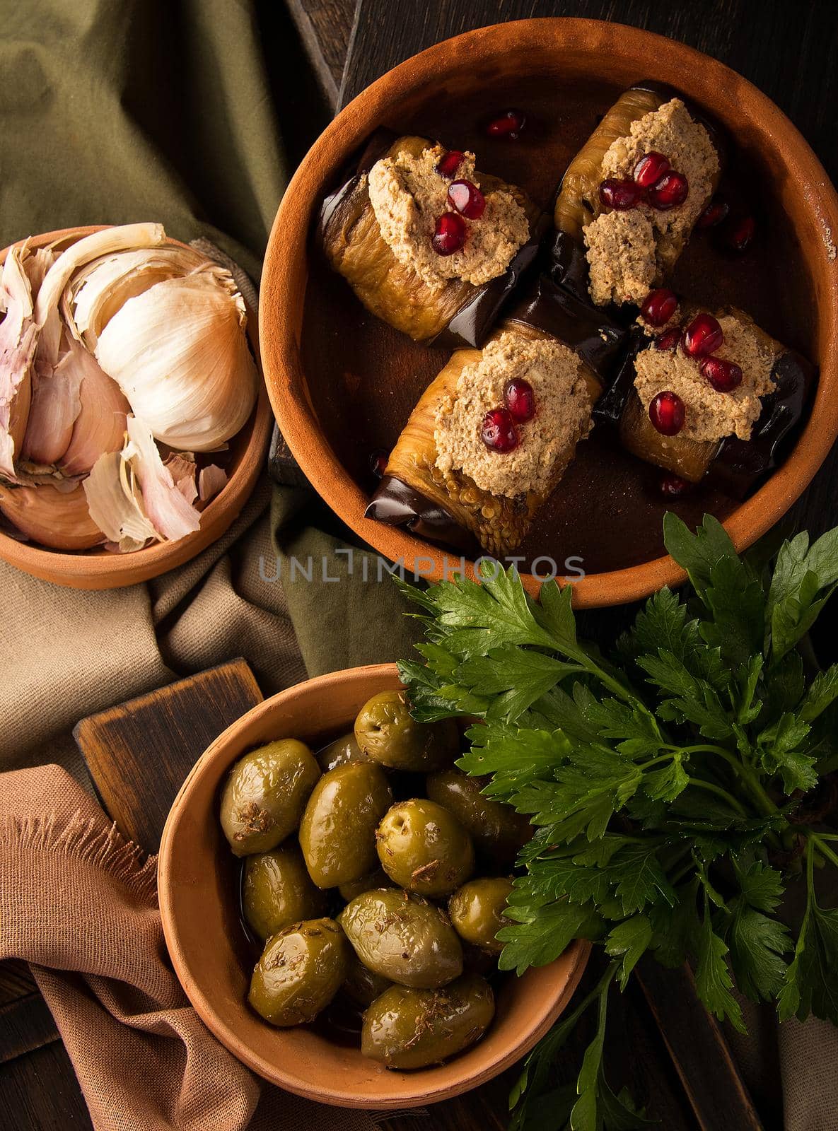 A vertical shot of eggplant rolls