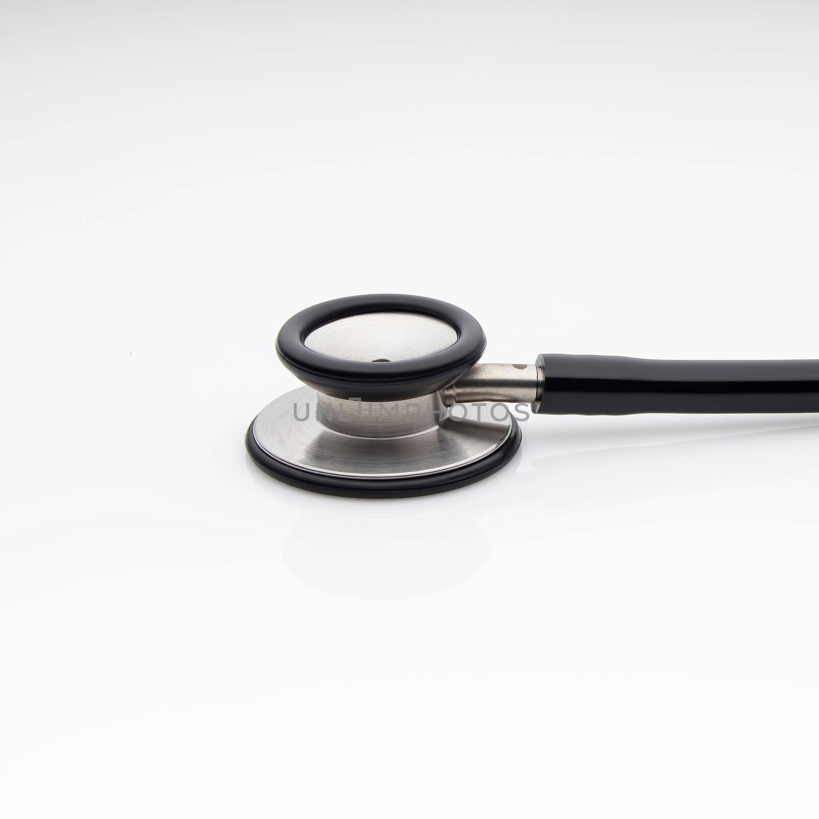 The diaphragm of medical stethoscope isolated on a white background