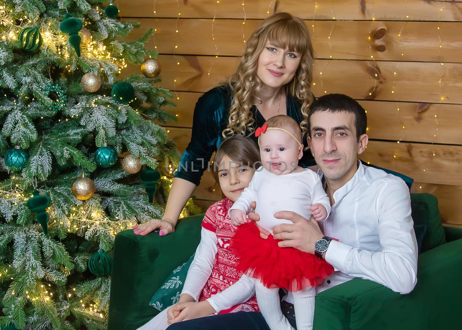 Christmas family on a beautiful background. Selective focus. by yanadjana