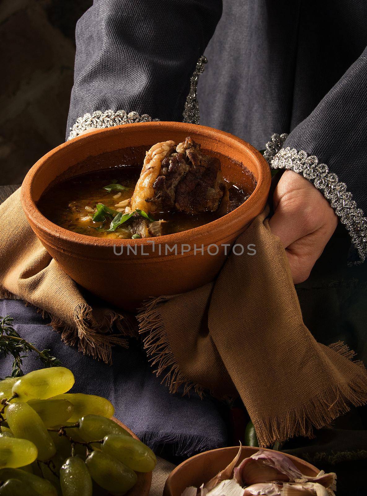 Vertical shot of a chef serving a gourmet dish by A_Karim