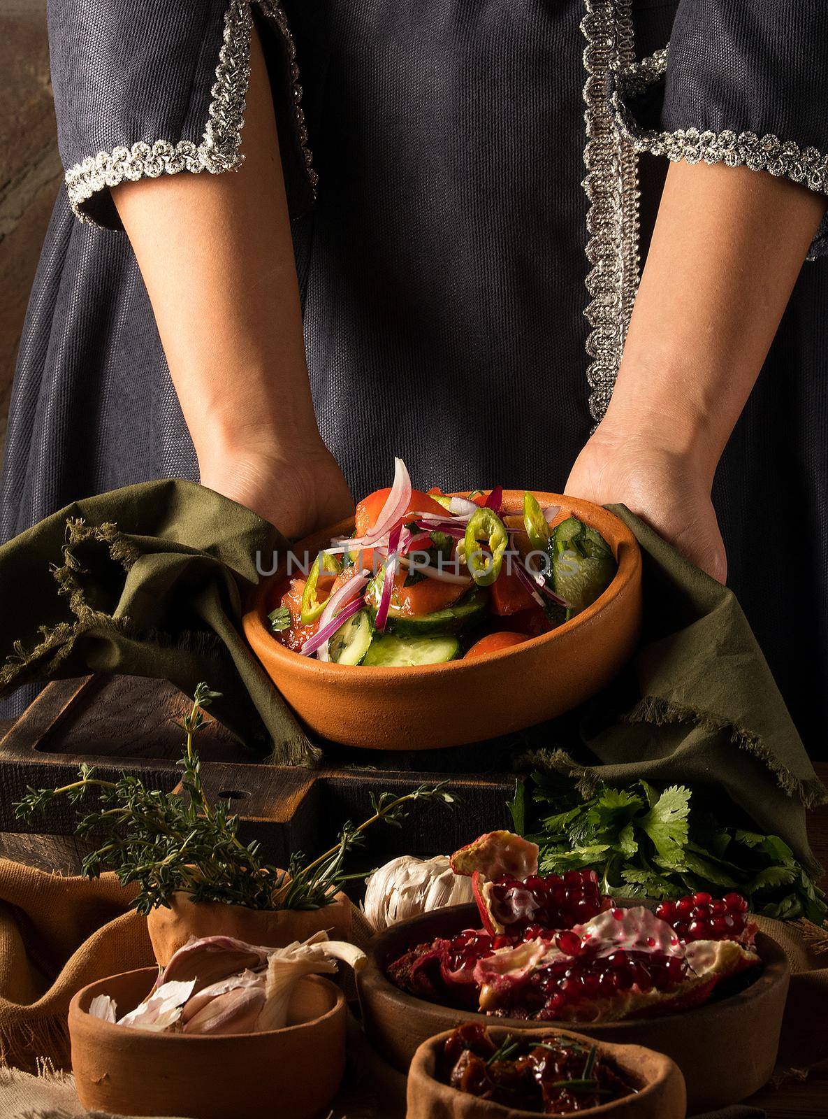 A shot of a person putting dishes on the table