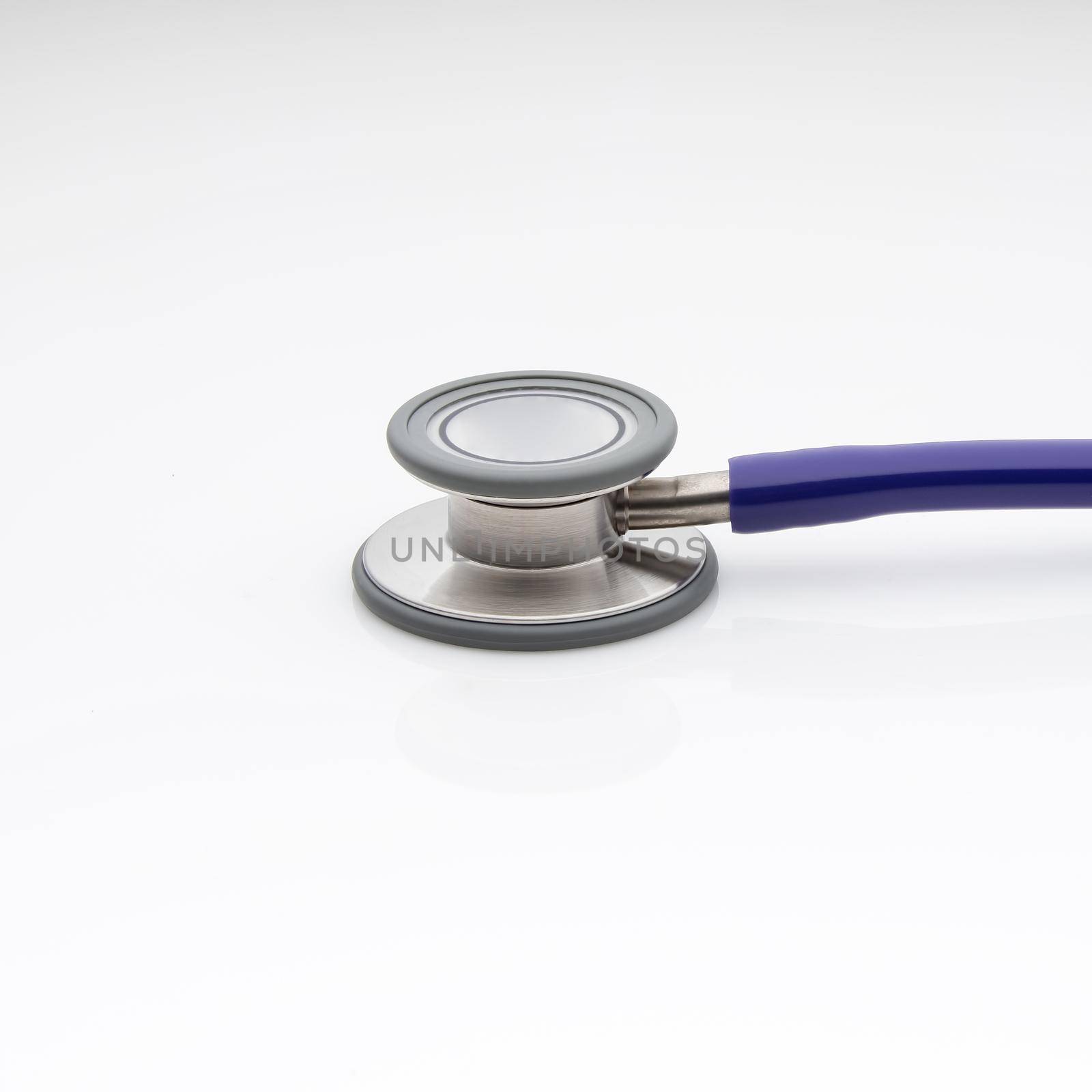 Diaphragm of medical stethoscope isolated on a white background by A_Karim
