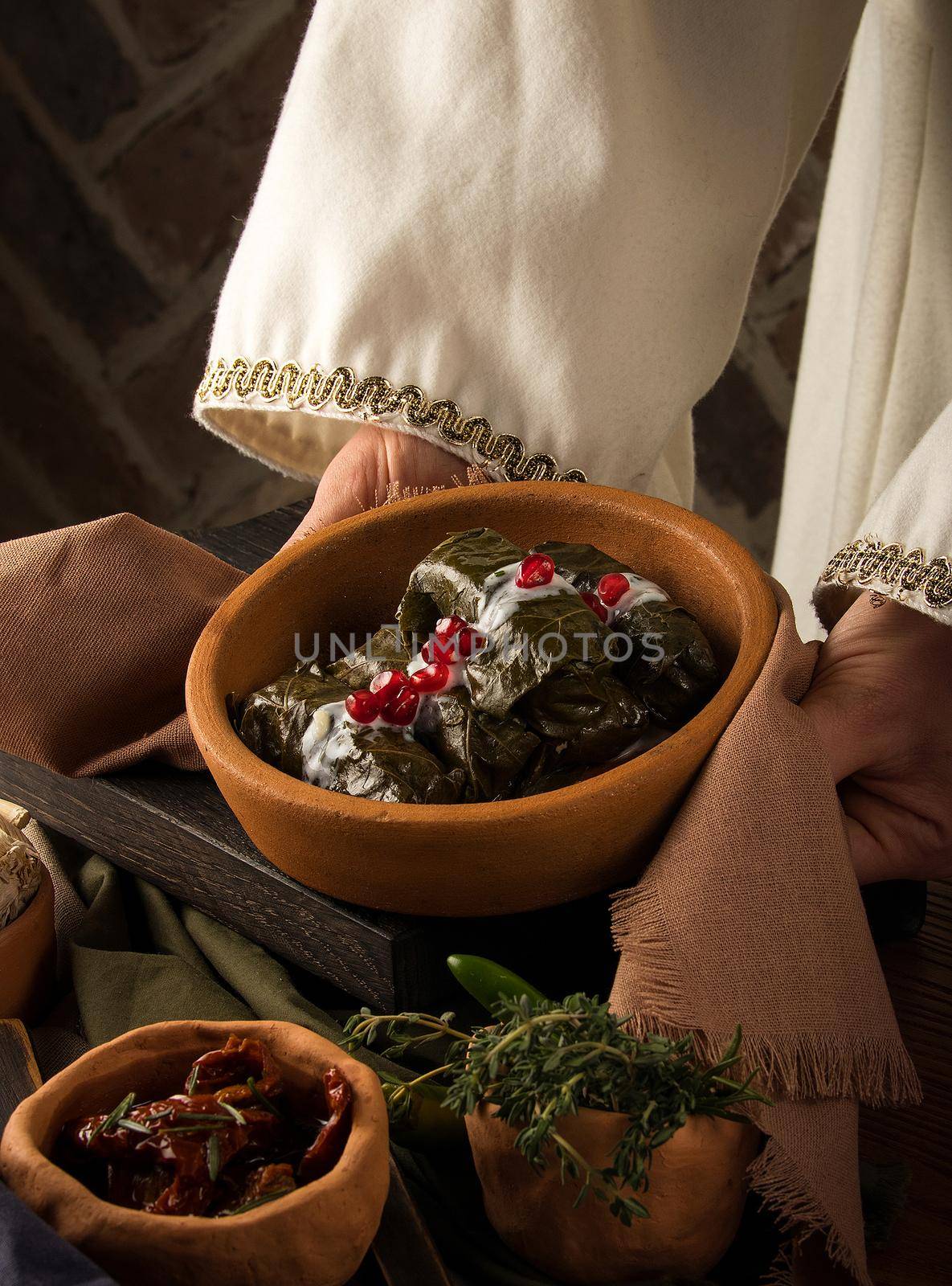 Close up shot of a dolma covered in grape leaves by A_Karim