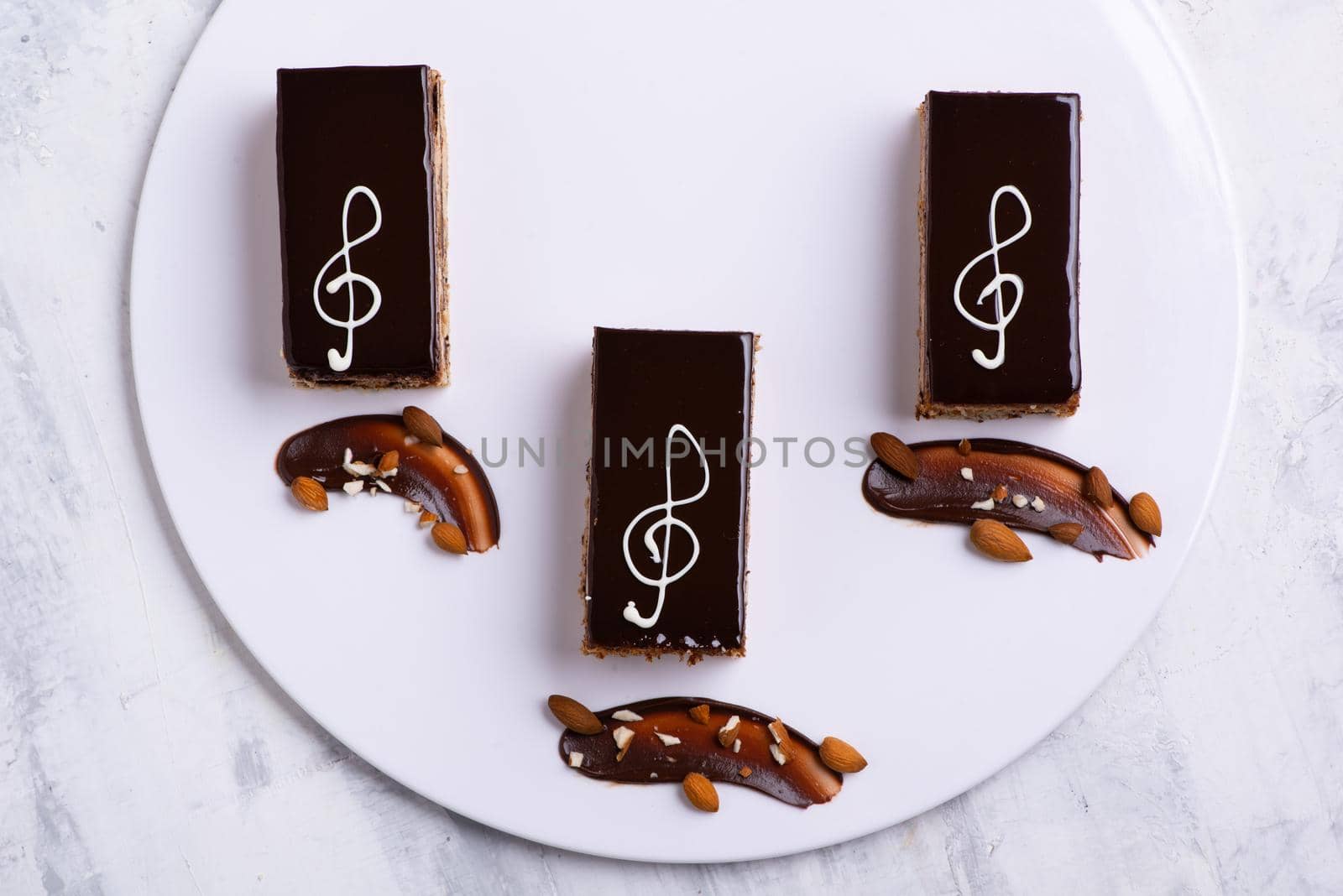 A serving of delicious chocolate cake pieces on a white plate