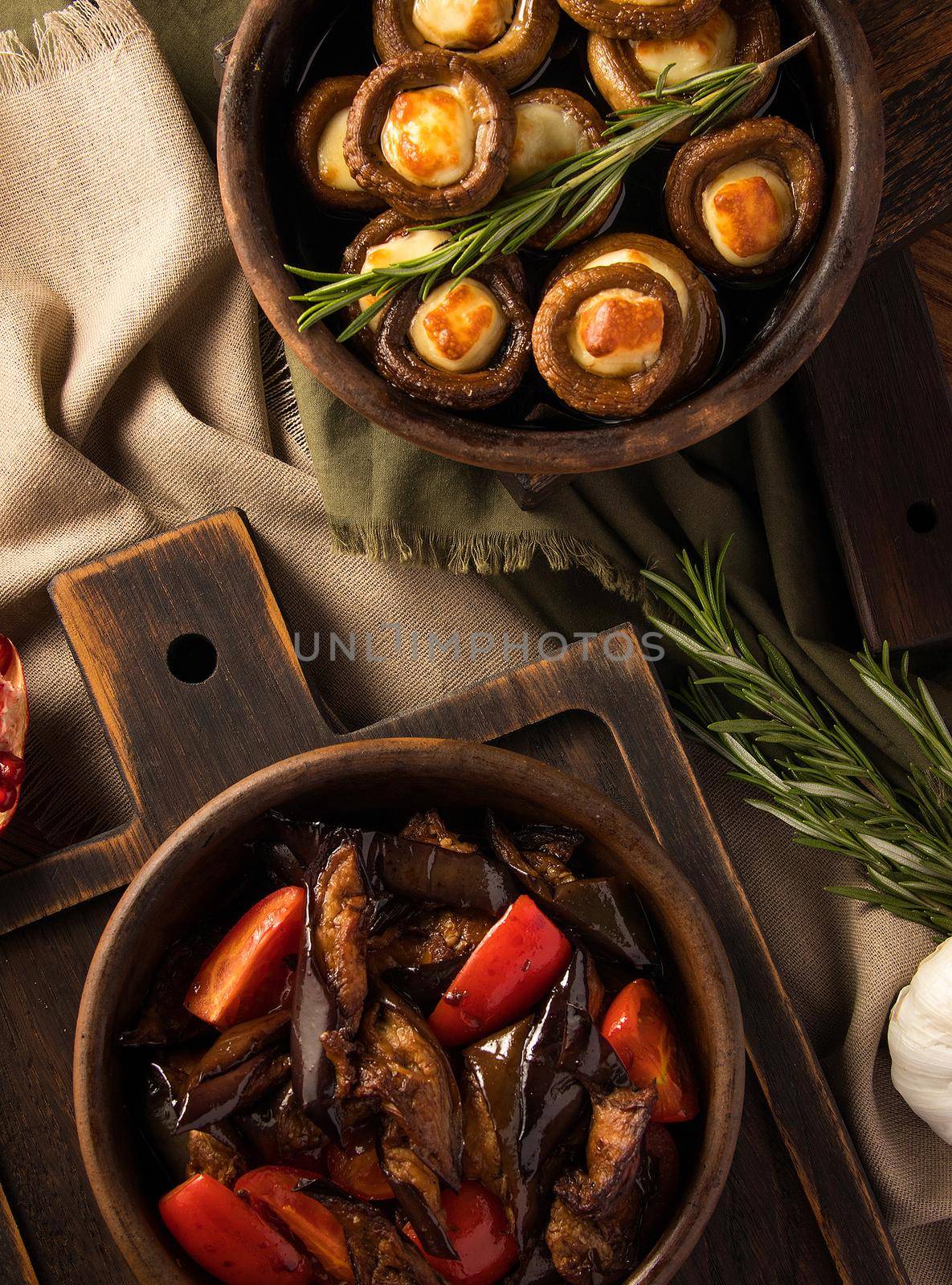 A top view shot of eggplant salads and mushrooms