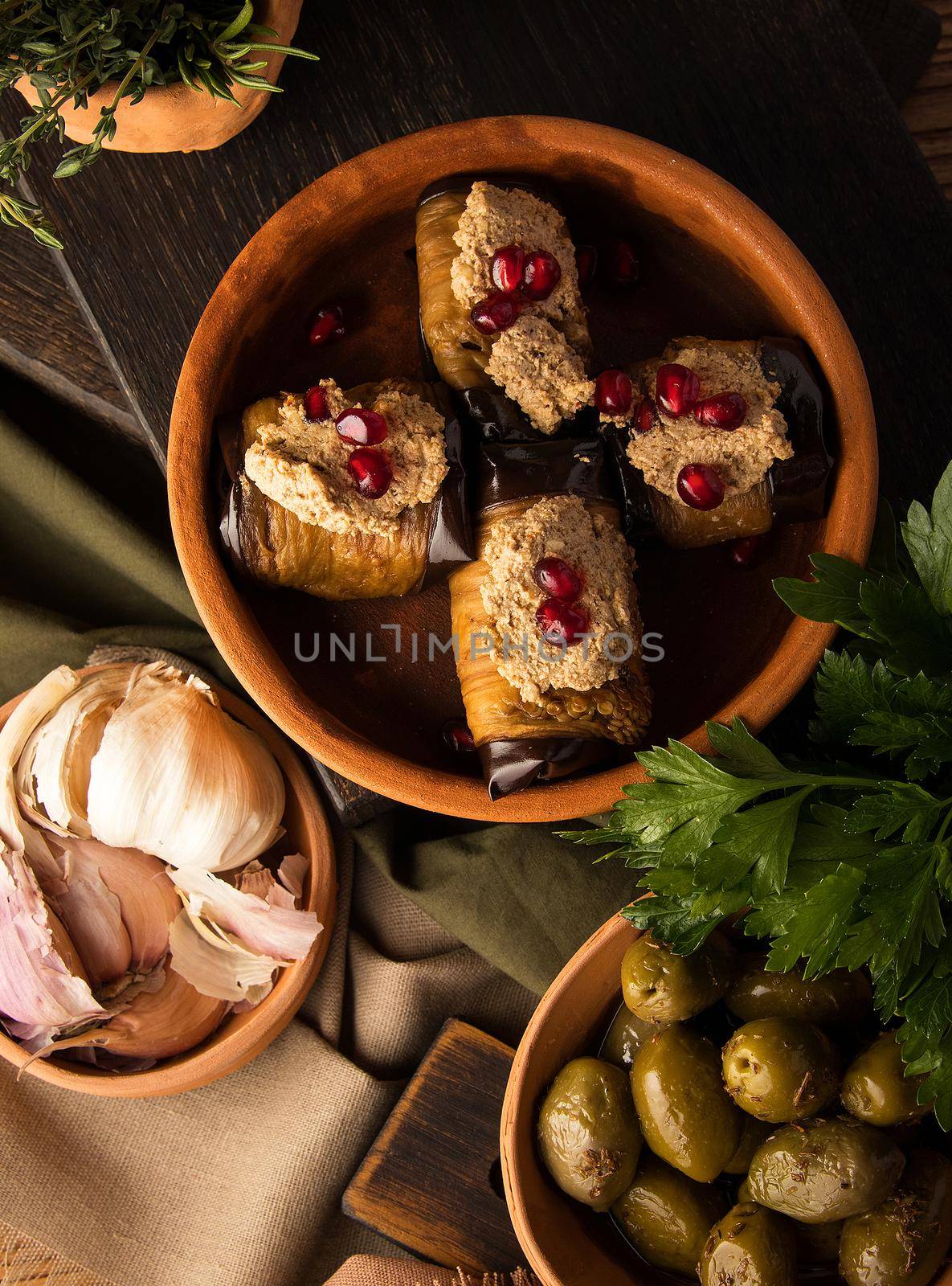 A vertical shot of eggplant rolls