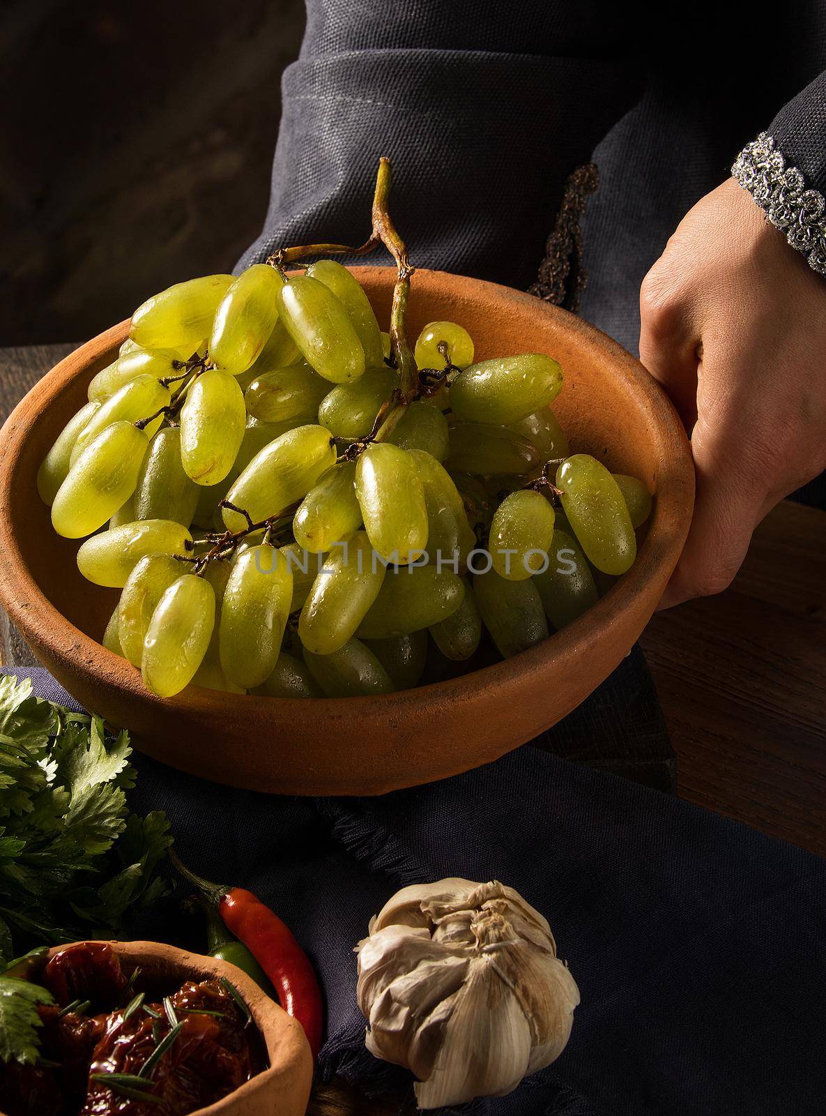 Shot of grapes in a bowl by A_Karim