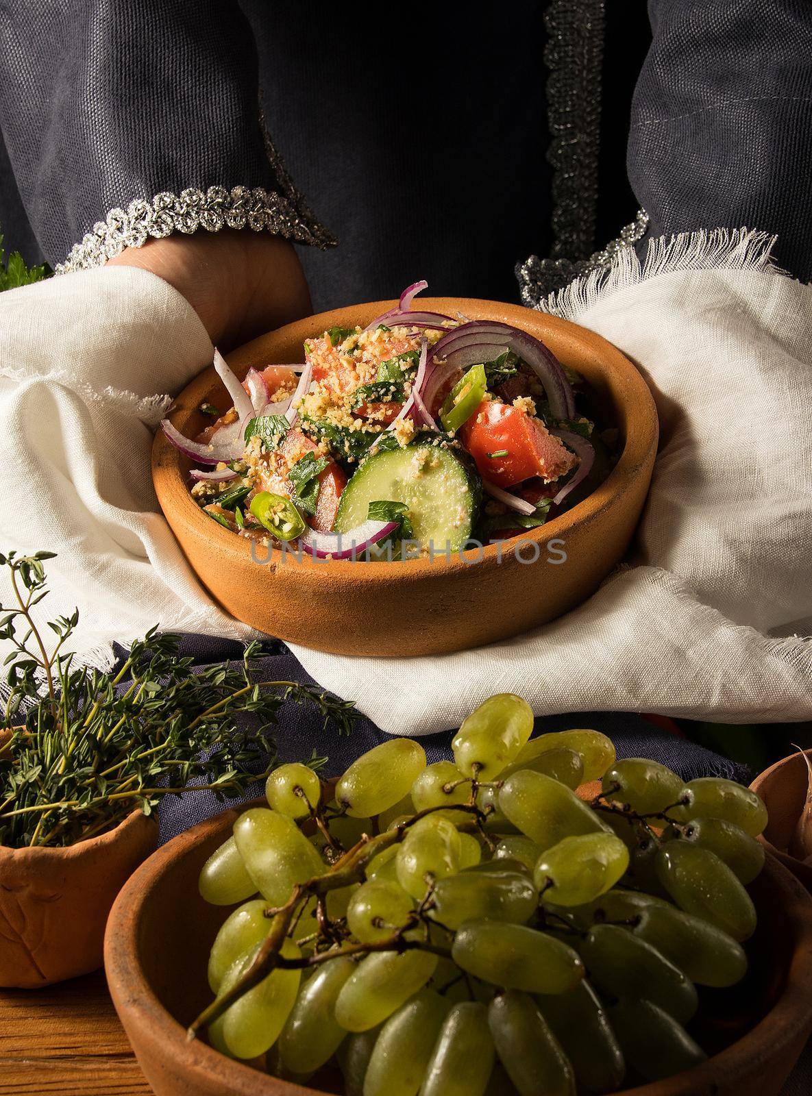 A vertical picture of a dish in hands