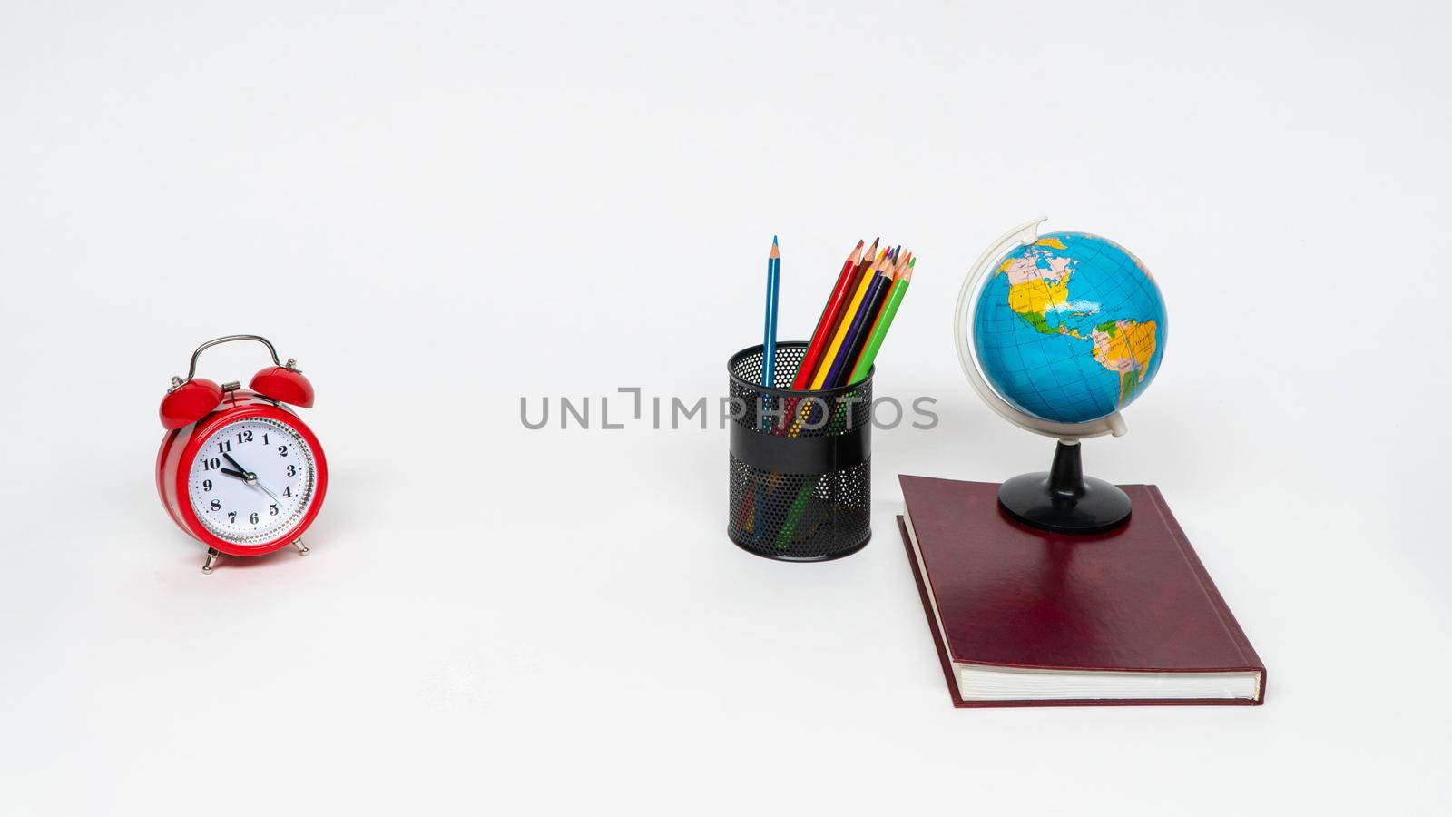 Educational school supplies on a white background. by A_Karim