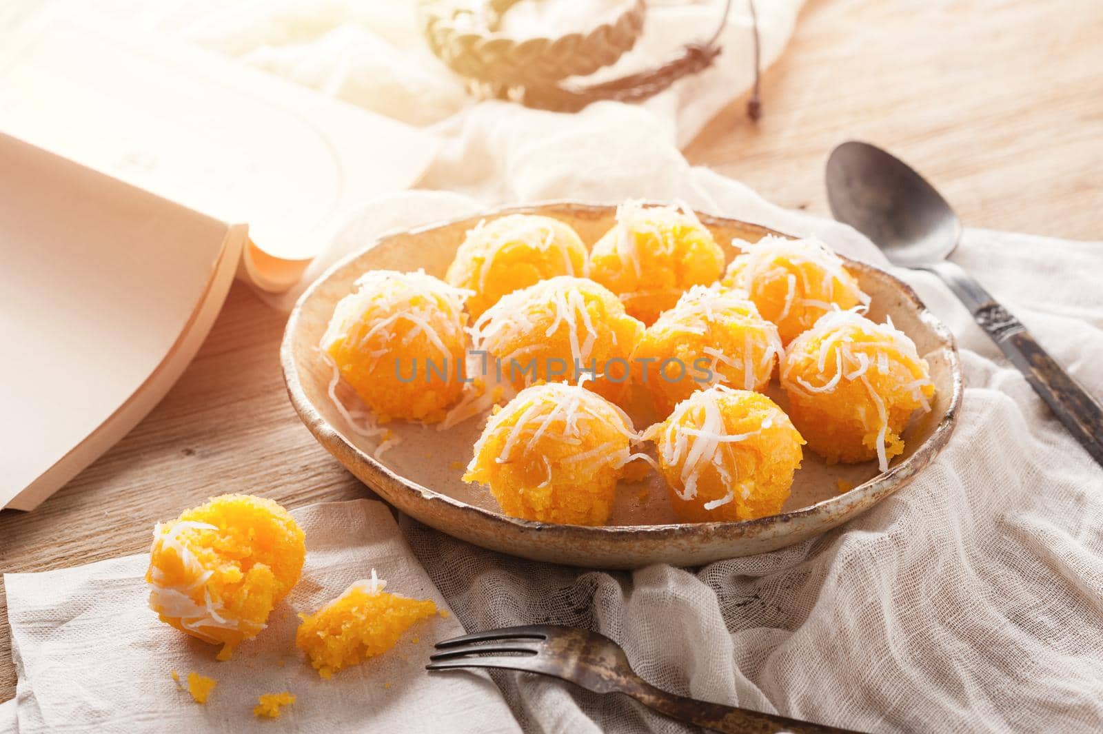 Toddy palm cake or Kanom Tan, Thai traditional dessert. Khanom tan is made from rice flour, ripe sugar palm fruit, coconut milk, scraped coconut, sugar and salt.