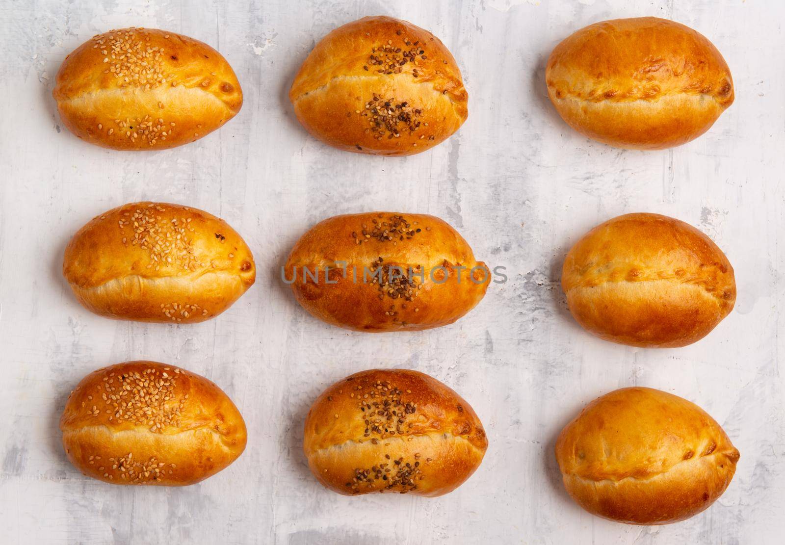 A top view of a number of tasty baked pastry on a table