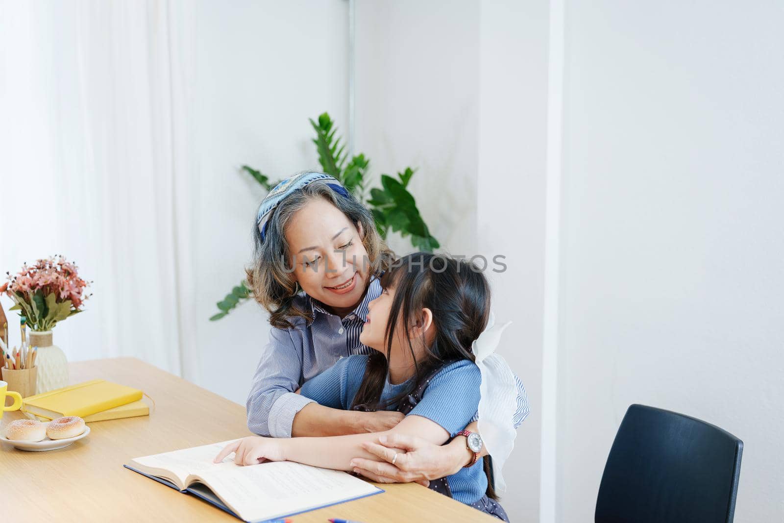 Asian portrait, grandchild granddaughter grandma grandmother and granddaughter happily join in activities to enhance skills for grandchildren by Manastrong