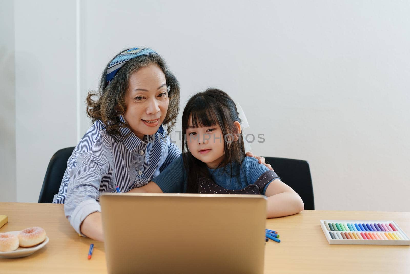 Asian portrait, grandchild granddaughter grandma grandmother and granddaughter happily join in activities to enhance skills for grandchildren by Manastrong