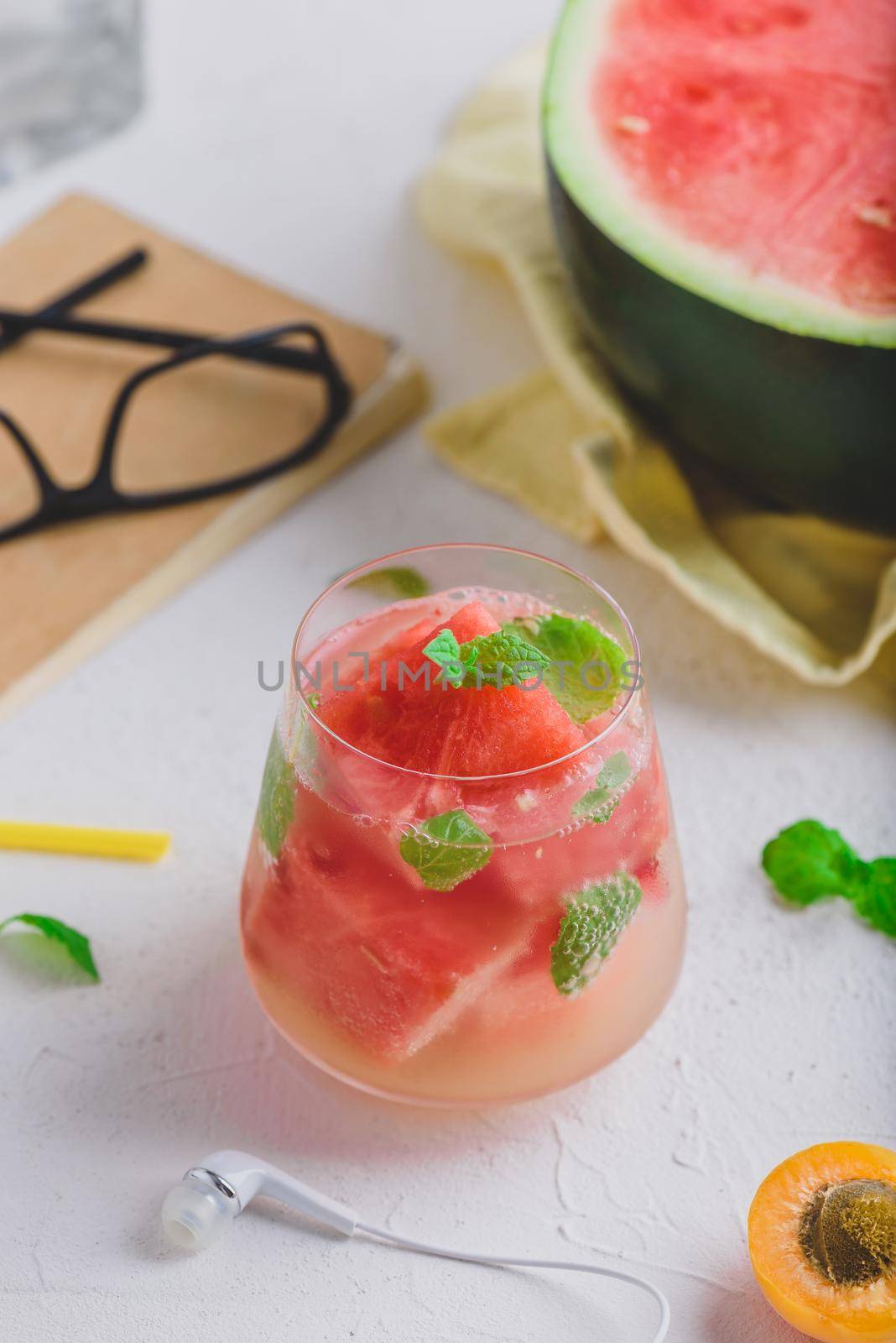 Fresh watermelon, gin cocktail with soda and garnished with mint leaves