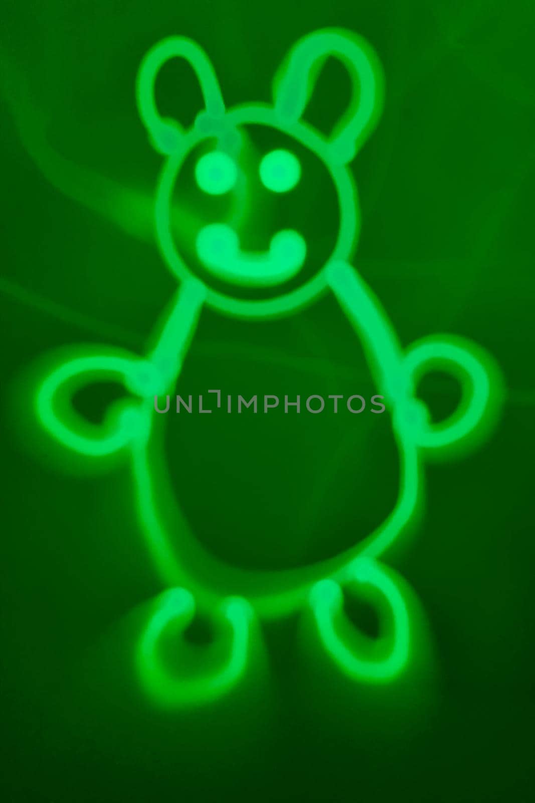 Funny picture of a bear on a green background