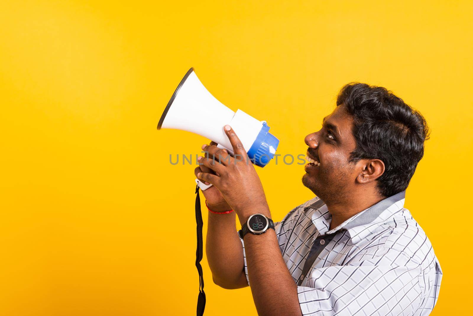 black woman standing to make announcement message shouting screaming in megaphone by Sorapop