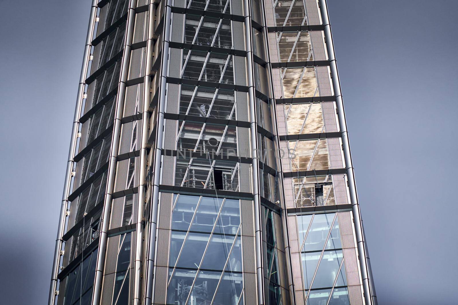 Russia, St. Petersburg, 10 June 2022: The skyscraper Lakhta center of the gas company Gazprom at sunset, glass and iron facade. High quality photo