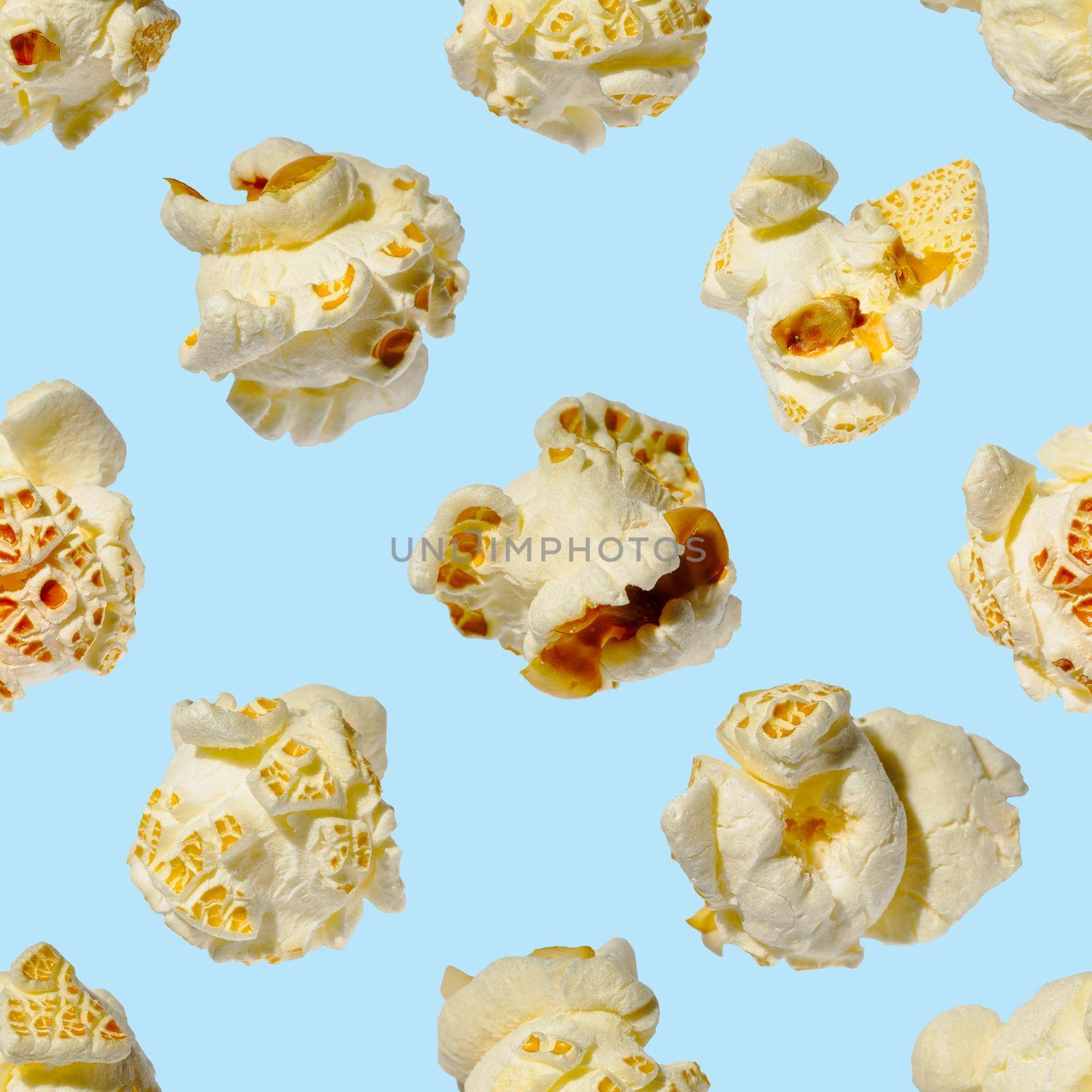 seamless pattern - popcorn. popcorn on a blue background, pattern for designer. packing design background