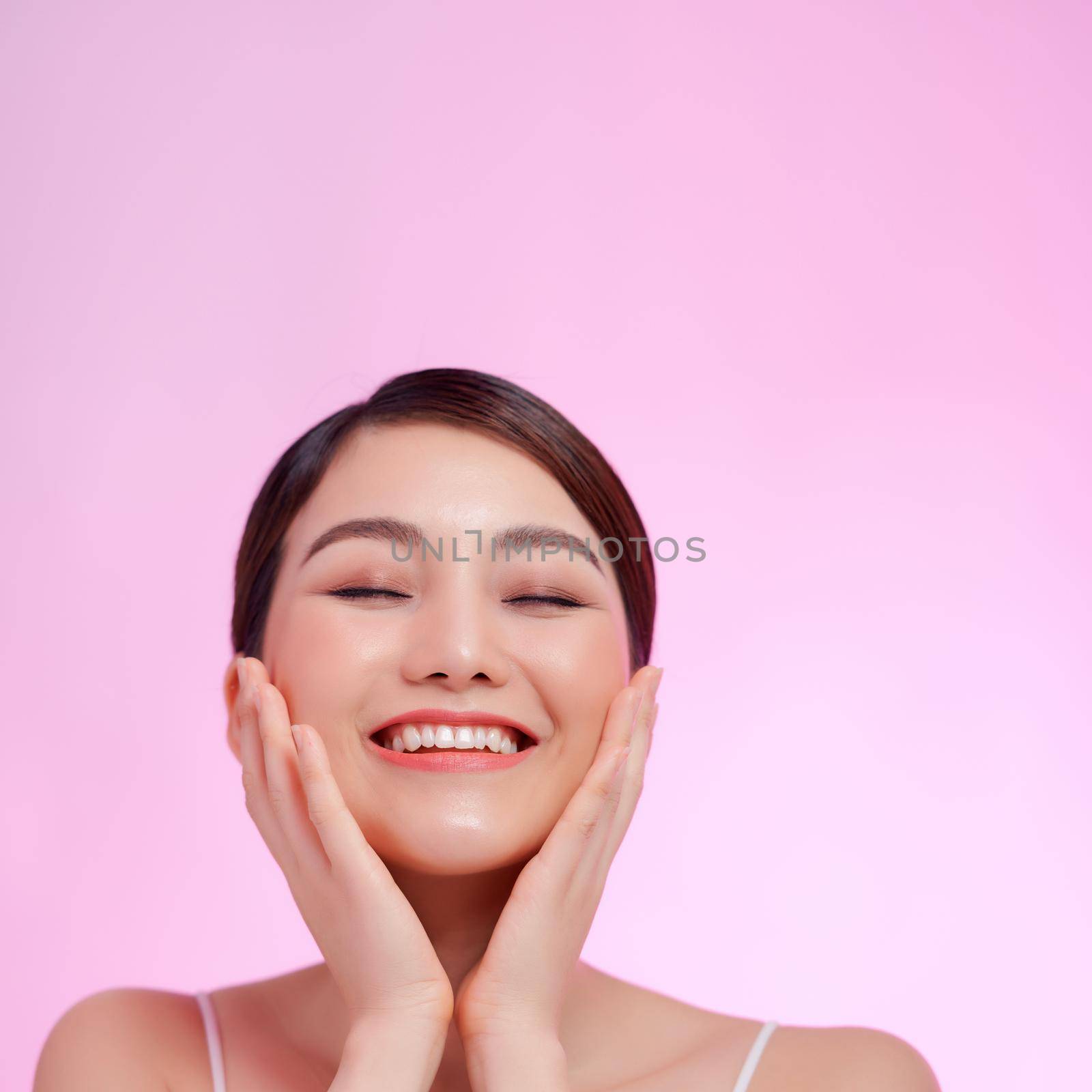 Beauty woman healthy skin concept natural makeup beautiful model girl face hands touching by makidotvn
