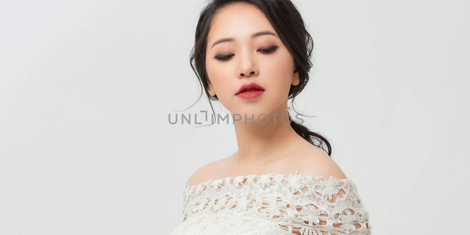 Portrait of beautiful woman on white background by makidotvn