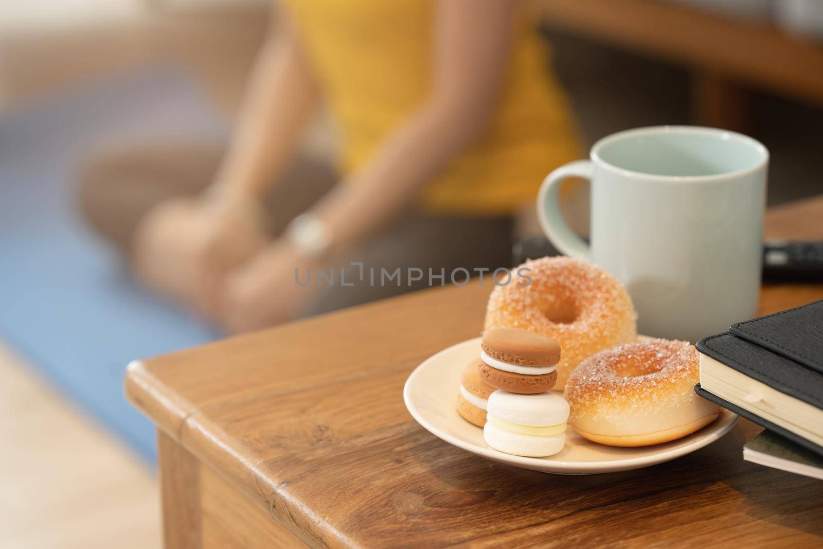 Delicious diet cake on plate while exercise at home. Weight loss Calories counting , diet , food control concept