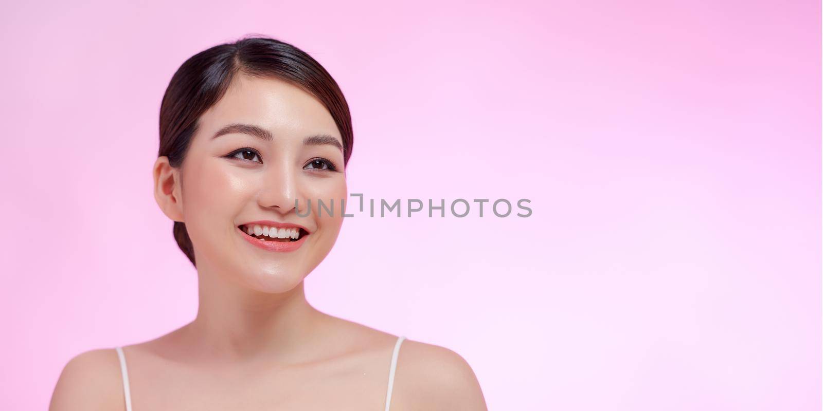 Portrait of beautiful young woman on color background by makidotvn