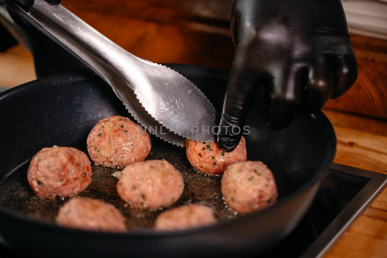 Close Up Shot Meatballs Frying on Hot Pan