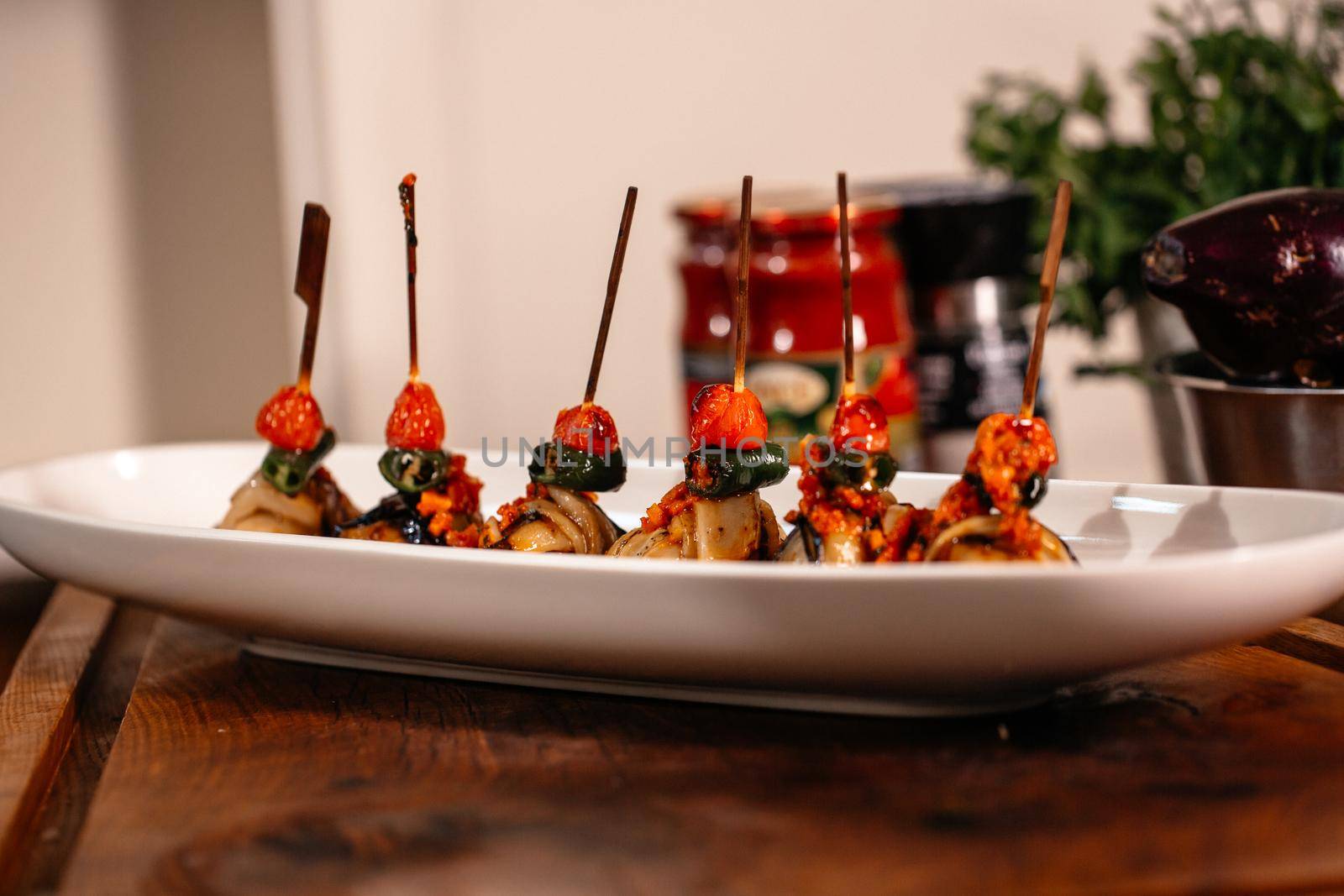 Fried Eggplant with Peppers, tomatoes and Appetizing Fried Beef Meatballs. by RecCameraStock