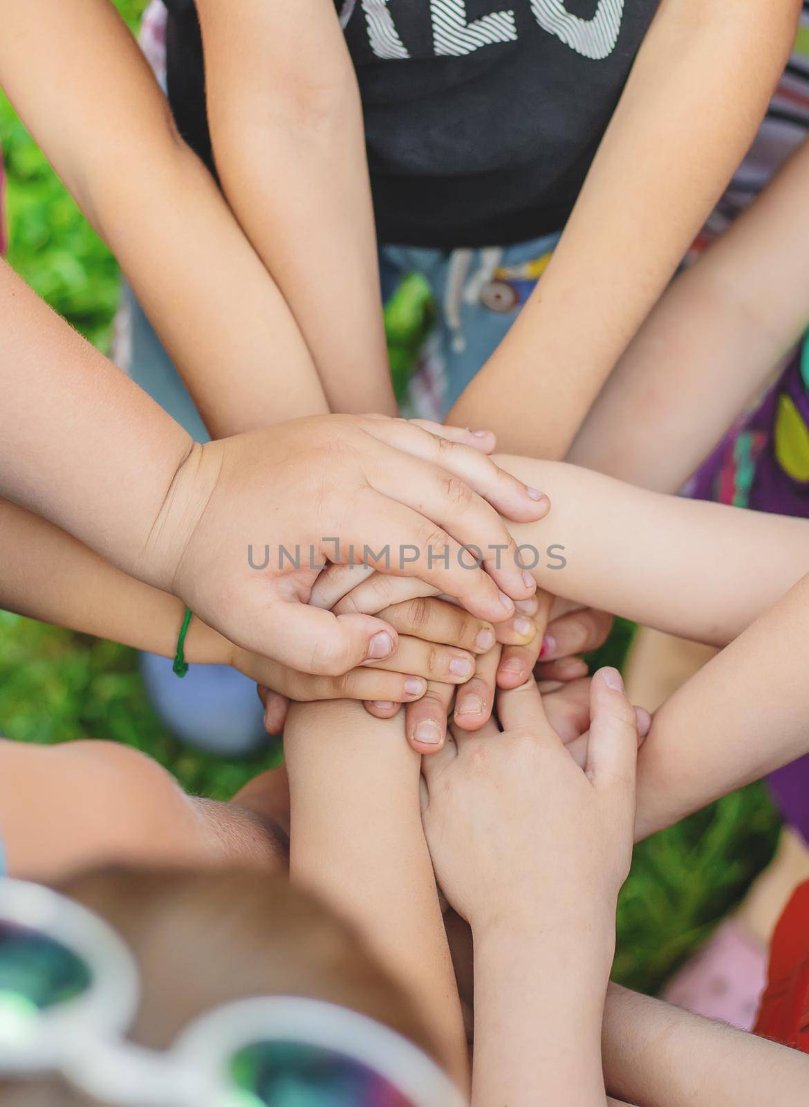 Children's hands together, street games. Selective focus. by yanadjana