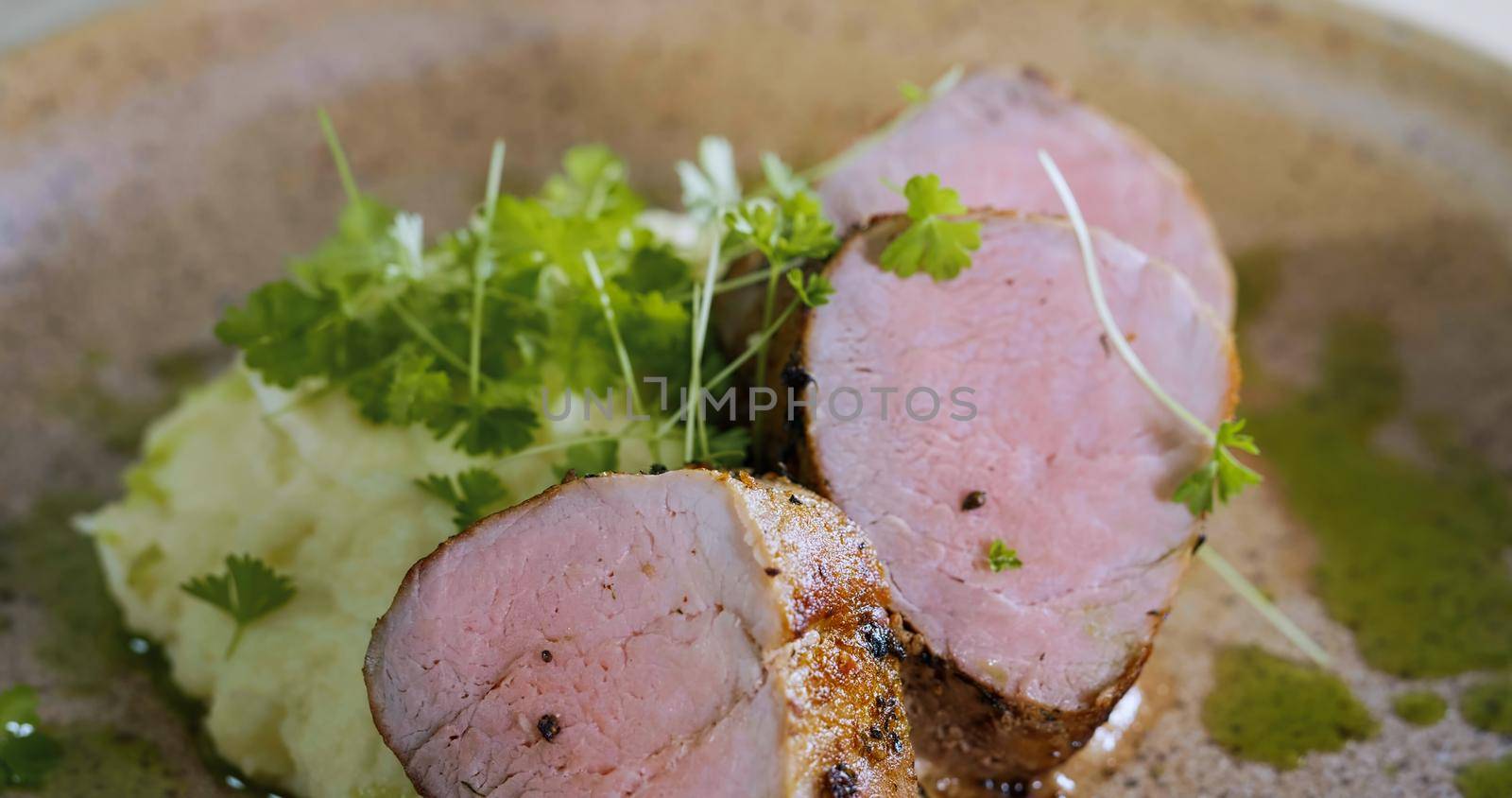 Pork Tenderloin Prepared for Serving - Art Food, Gourmet Meal Close Up. by RecCameraStock