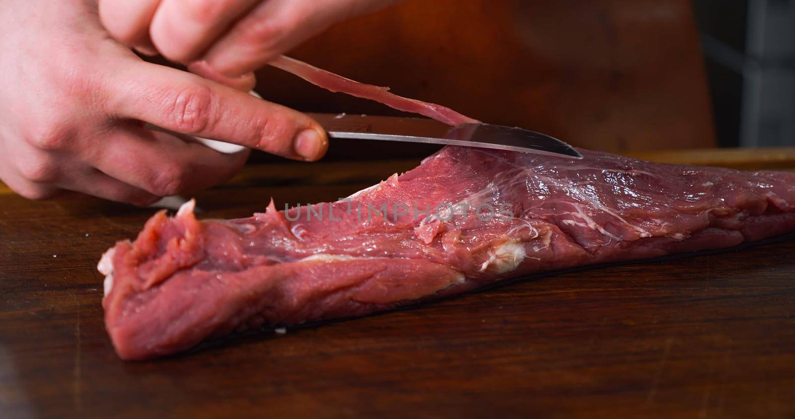 Fresh Raw Beef Meat As Preparation Before Cooking. by RecCameraStock