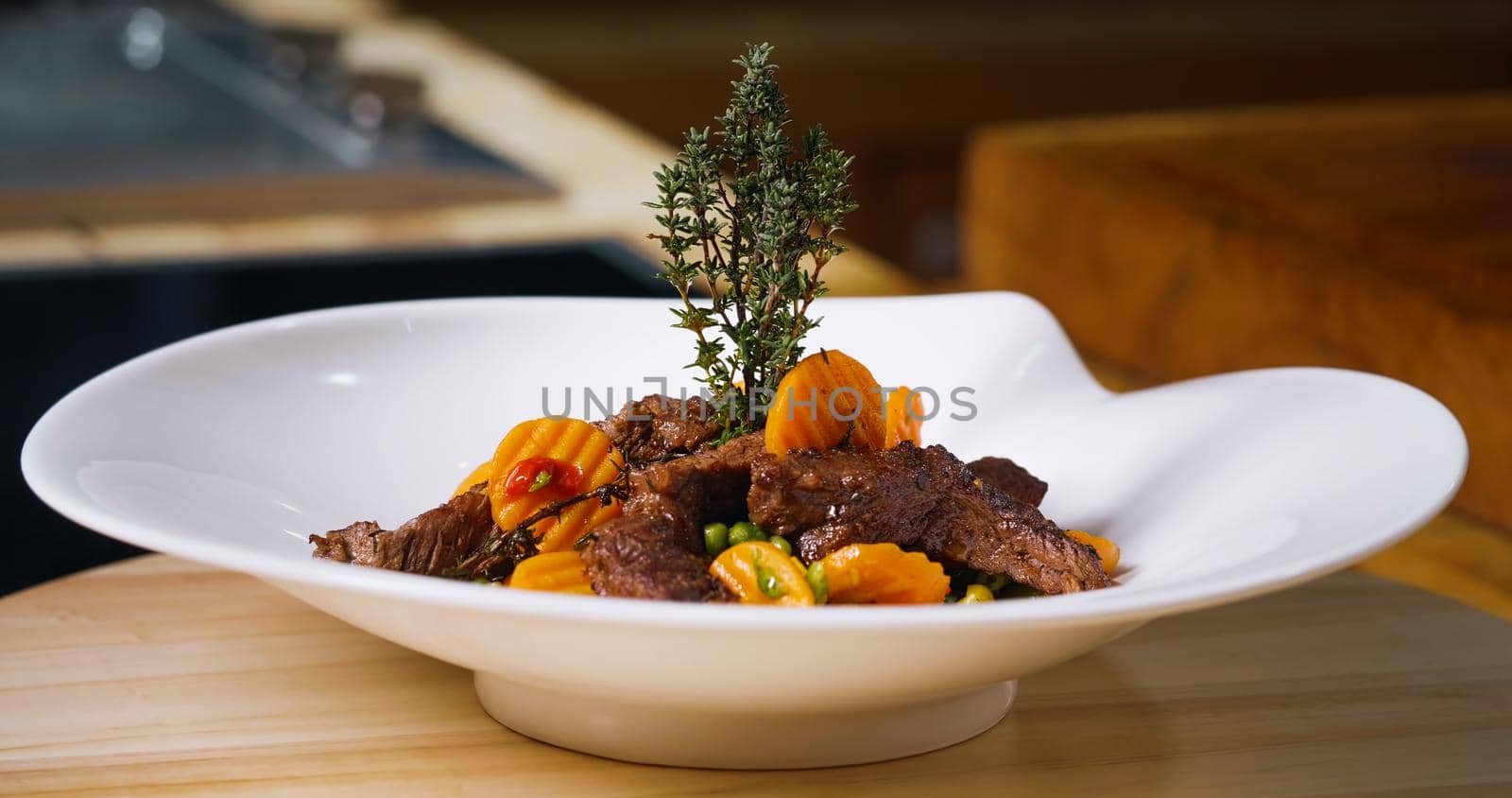 Beef Meal Presentation on White Plate. Chef Specialty Dish. by RecCameraStock