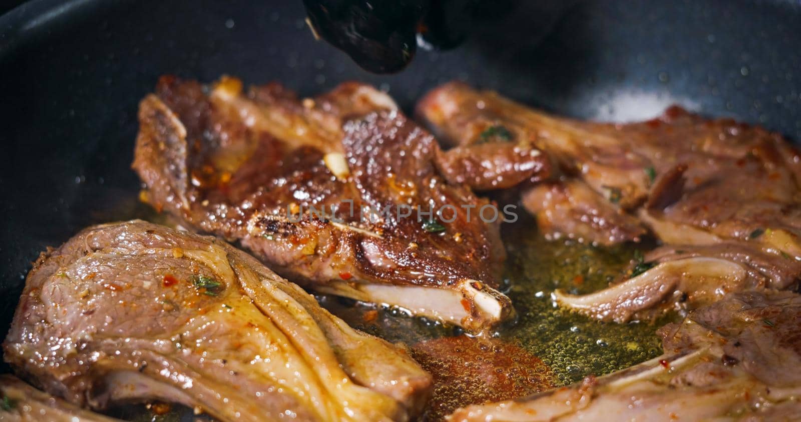Close Up Tasty Lamb Meat Frying. Appetizing Meat Dish. by RecCameraStock