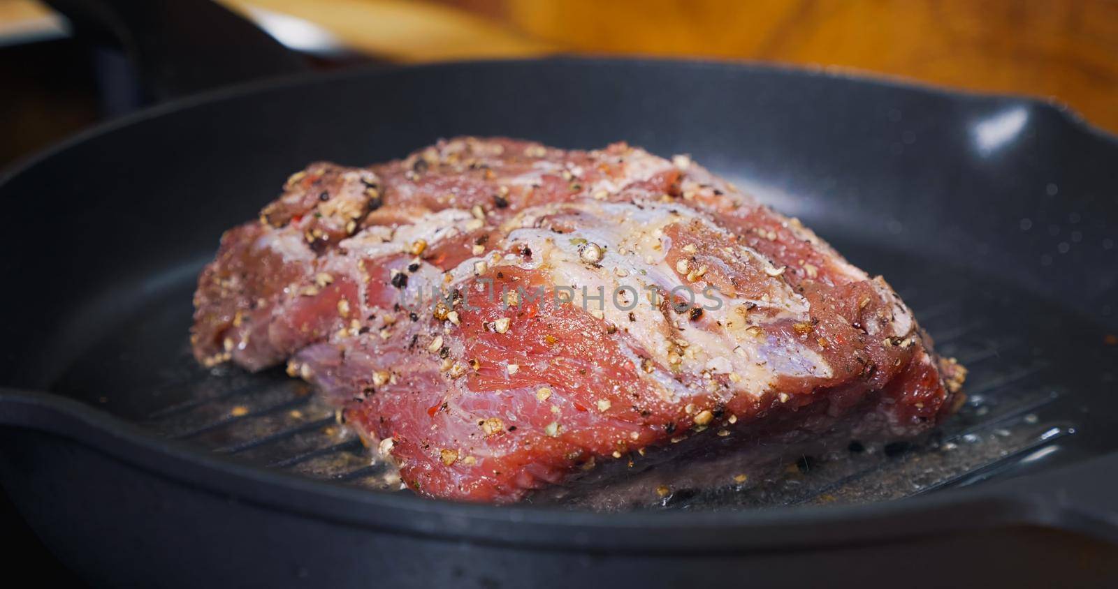 Delicious Juicy Meat Steak Cooking on Grill. Hot Pan. by RecCameraStock