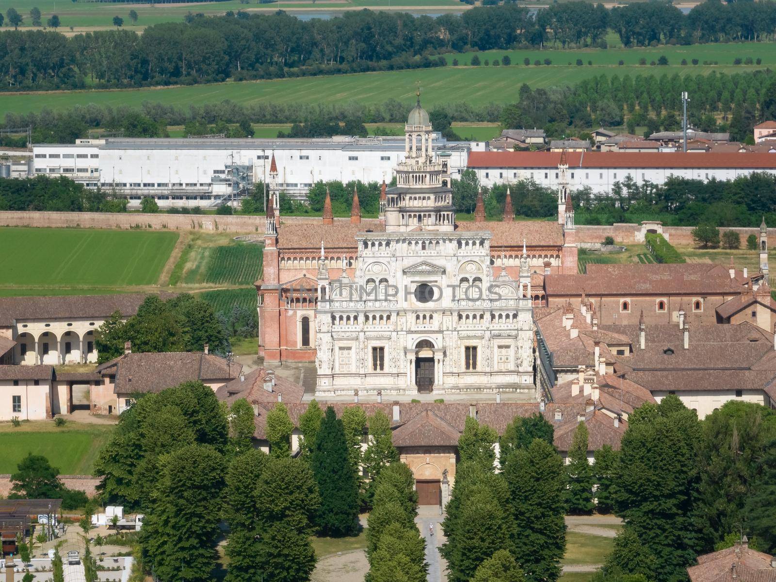 Aerial view of the Certosa di Pavia at sunny day, built in the late fourteenth century, courts and the cloister of the monastery and shrine in the province of Pavia, Lombardia, Italy