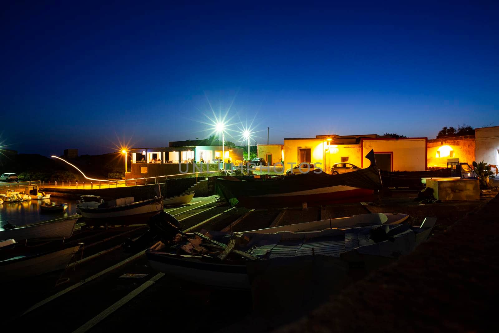 Night view of the Linosa old pier, Pelagie islands. Sicily