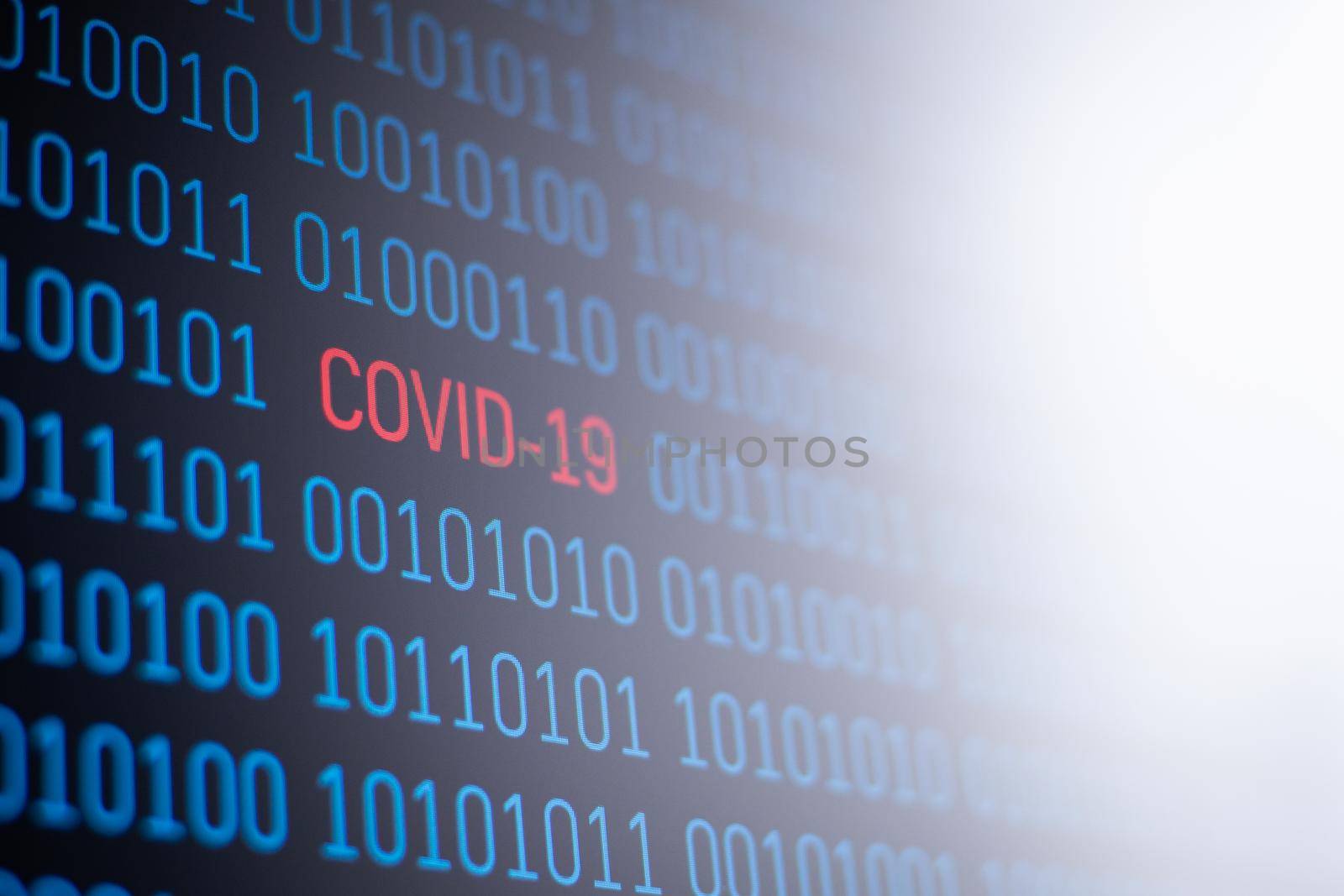 Binary computer code with red inscription Covid-19 by VitaliiPetrushenko