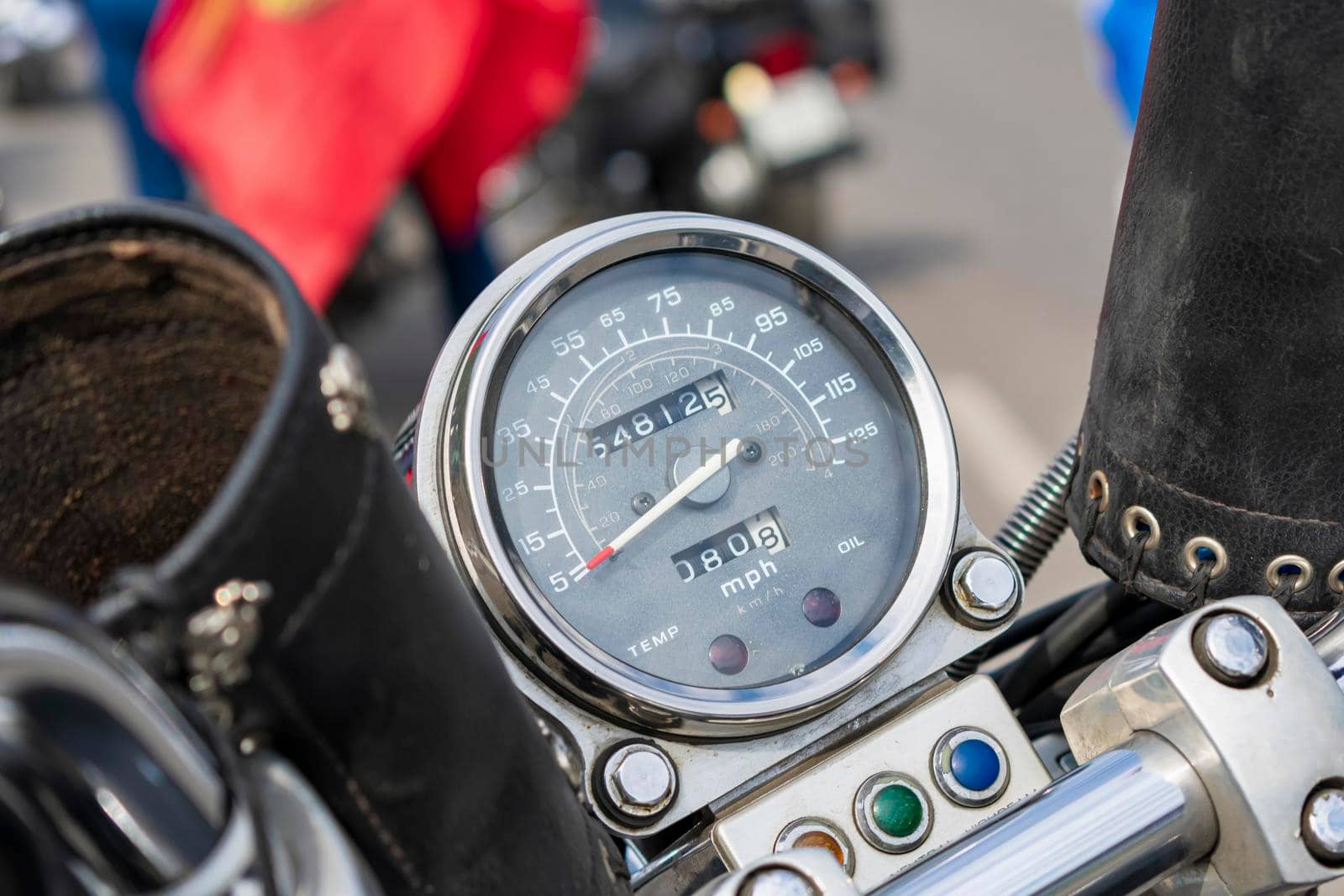 Analog speedometer of a powerful motorcycle in a shiny finish close-up