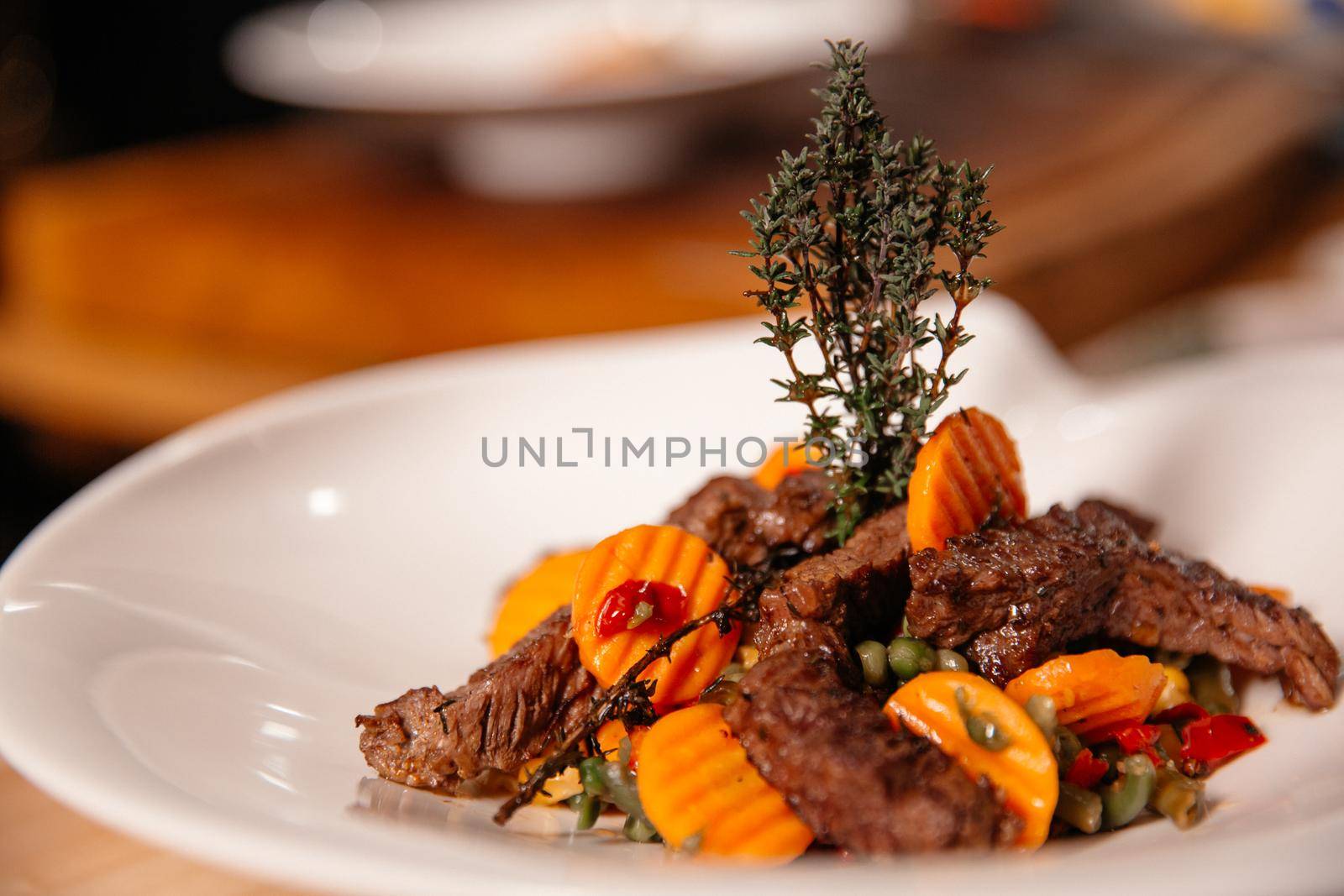 Beef Meal Presentation on White Plate by RecCameraStock