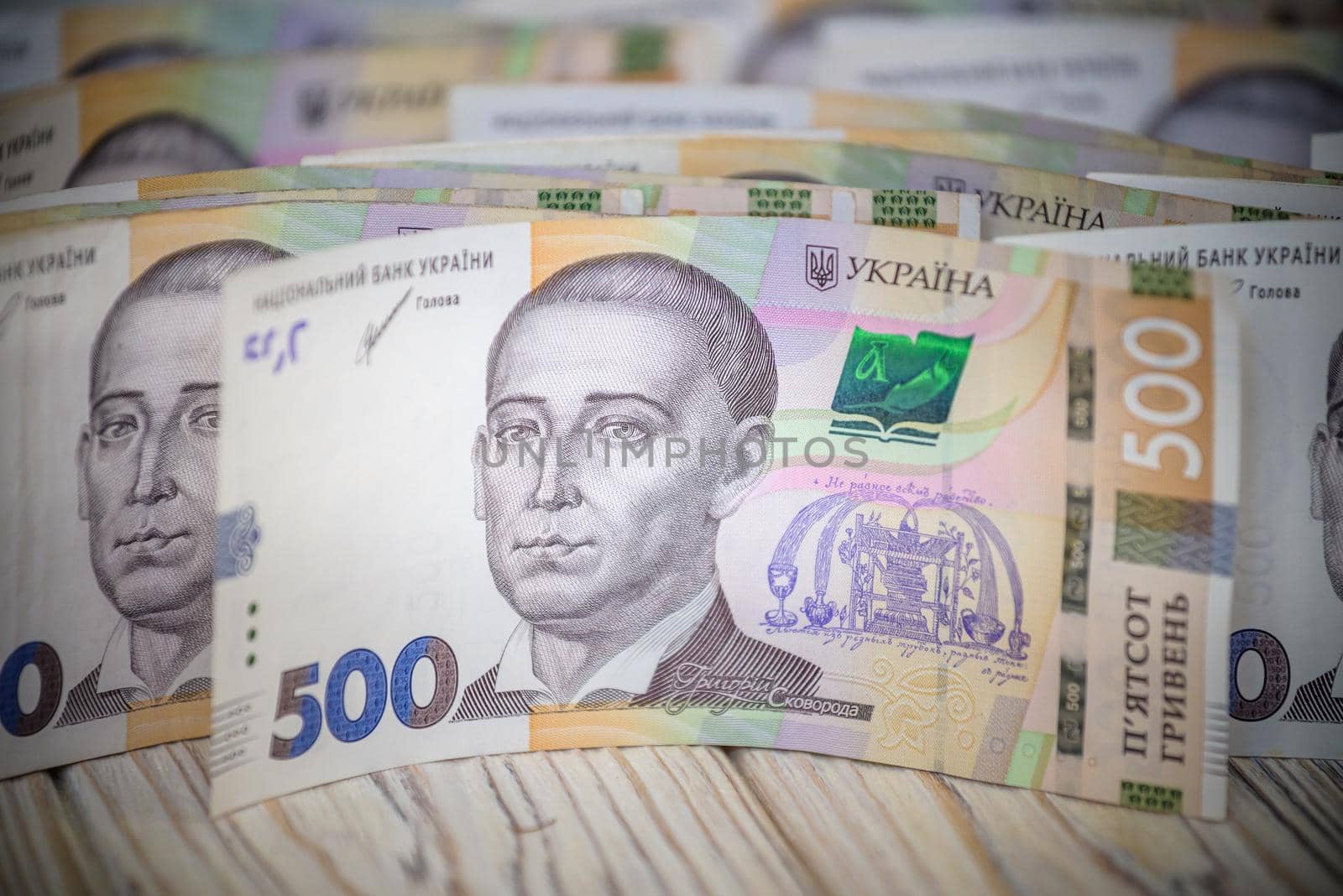 Stack of ukrainian money hryvnia grivna, hryvna with 500 banknotes.