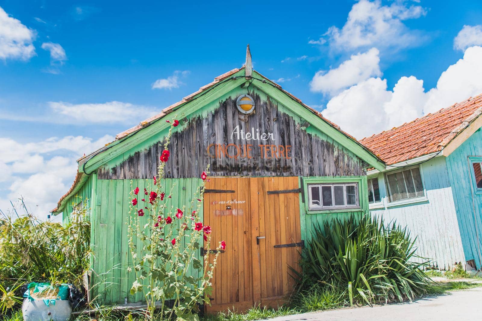 Colorful cabins on the harbor of Château d'Oléron, on the island of Oléron in France