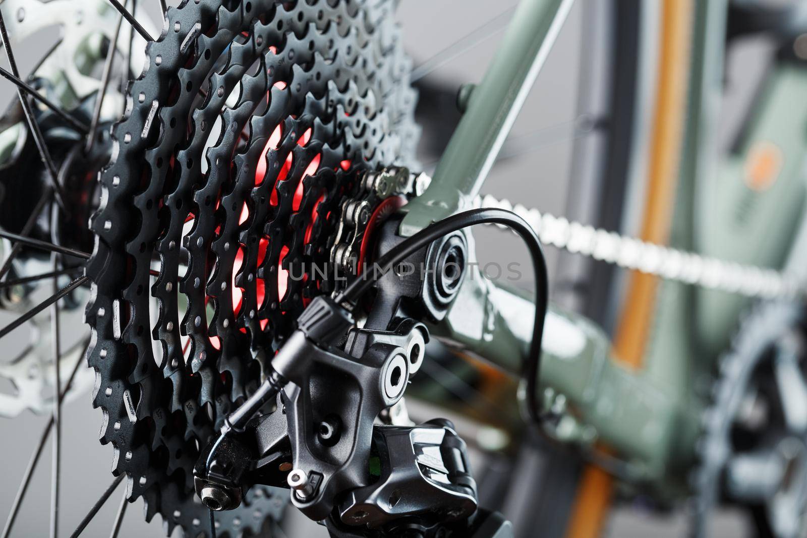 Rear bicycle cassette speeds with a wide range and chain close-up by AlexGrec