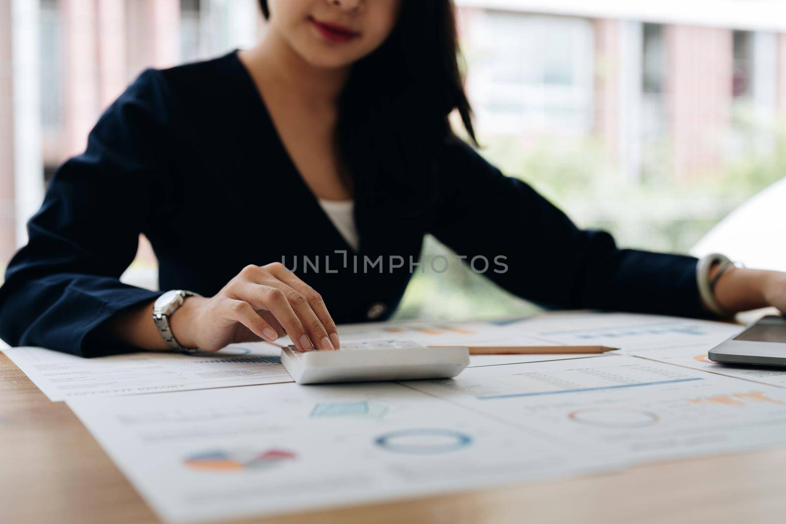Bookkeeper or financial inspector hands making report, calculating. Home finances, investment, economy, saving money or insurance concept.