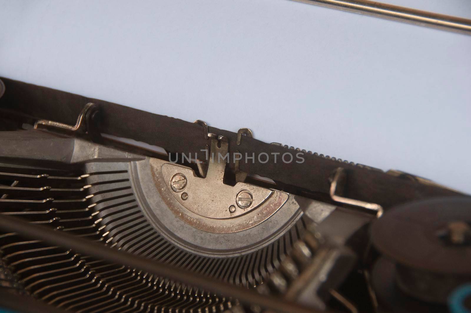 Selective view of an old typewriter in vintage color. Copy space.