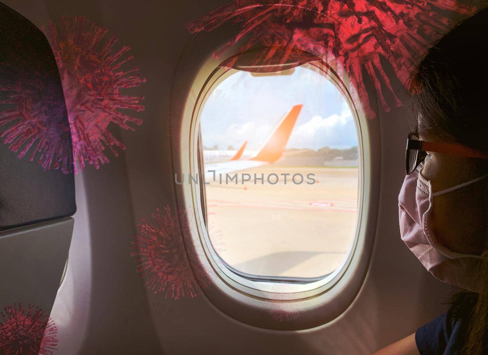 Woman wear surgical mask sit on passenger seat near cabin window of the airplane and monkeypox virus or coronavirus concept. Traveling by plane during monkeypox outbreak. Healthy habit on airplane.