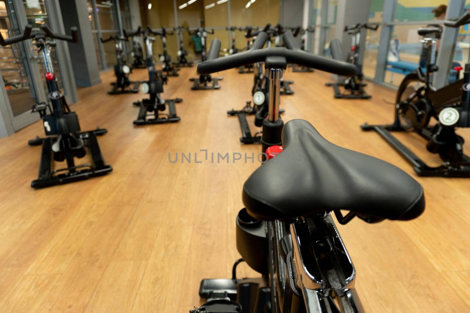 Group exercise background seat simulator bike black white gym isolated, from lifestyle pedal in healthy for aerobics studio, handle athletic. Fun hipster model, by 89167702191