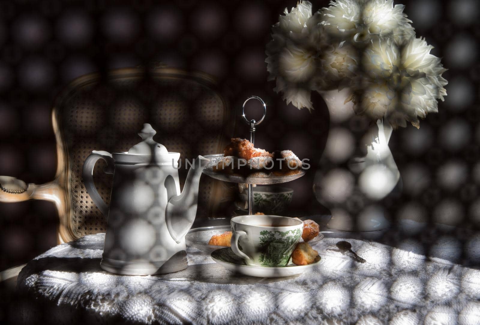 abstract photography over the back of a chair in blur, English style tea break by KaterinaDalemans